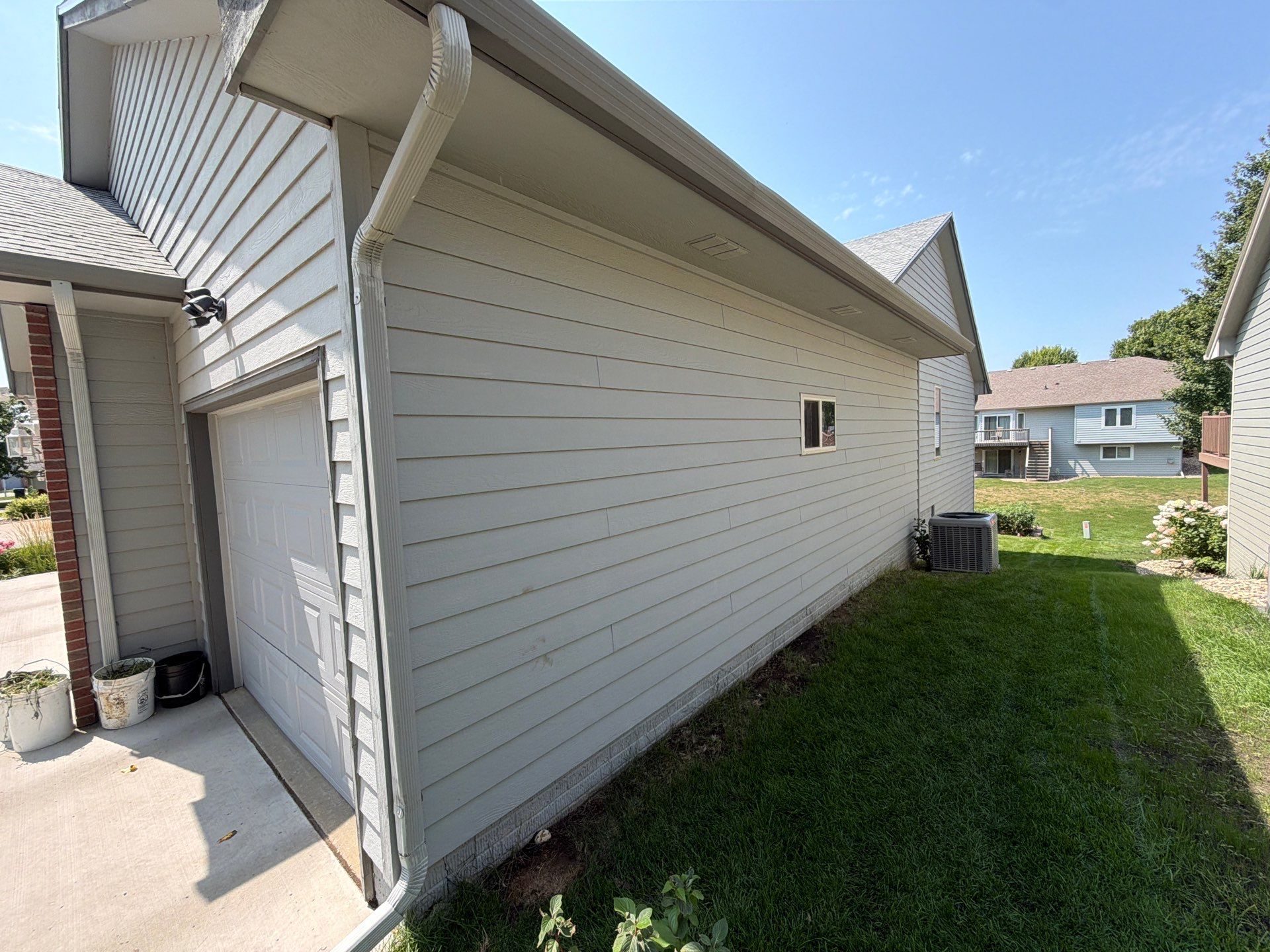 Exterior Painting for Vinyl Siding and Trim in Sioux Falls by Select Painting, Coatings & Garage Cabinets
