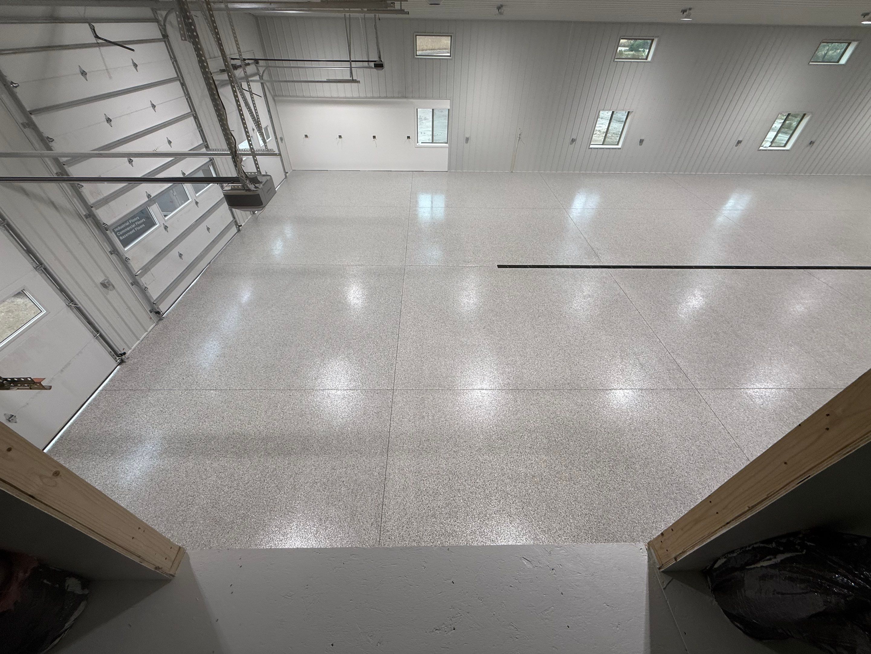 Custom Speckled Floor Coating for Large Montrose Shop by Select Painting, Coatings & Garage Cabinets