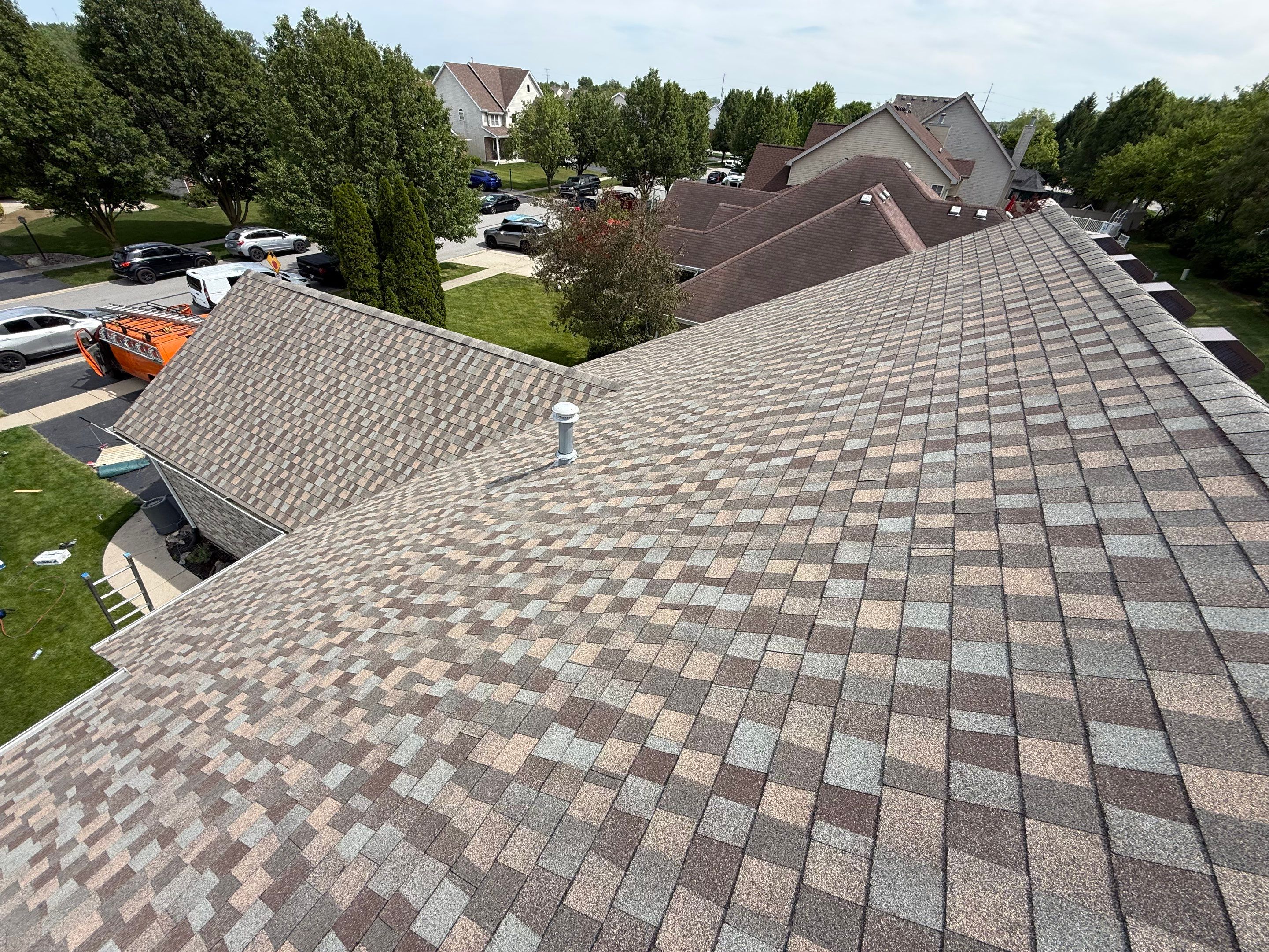 Roofing and gutters by Optimal Home Improvement 