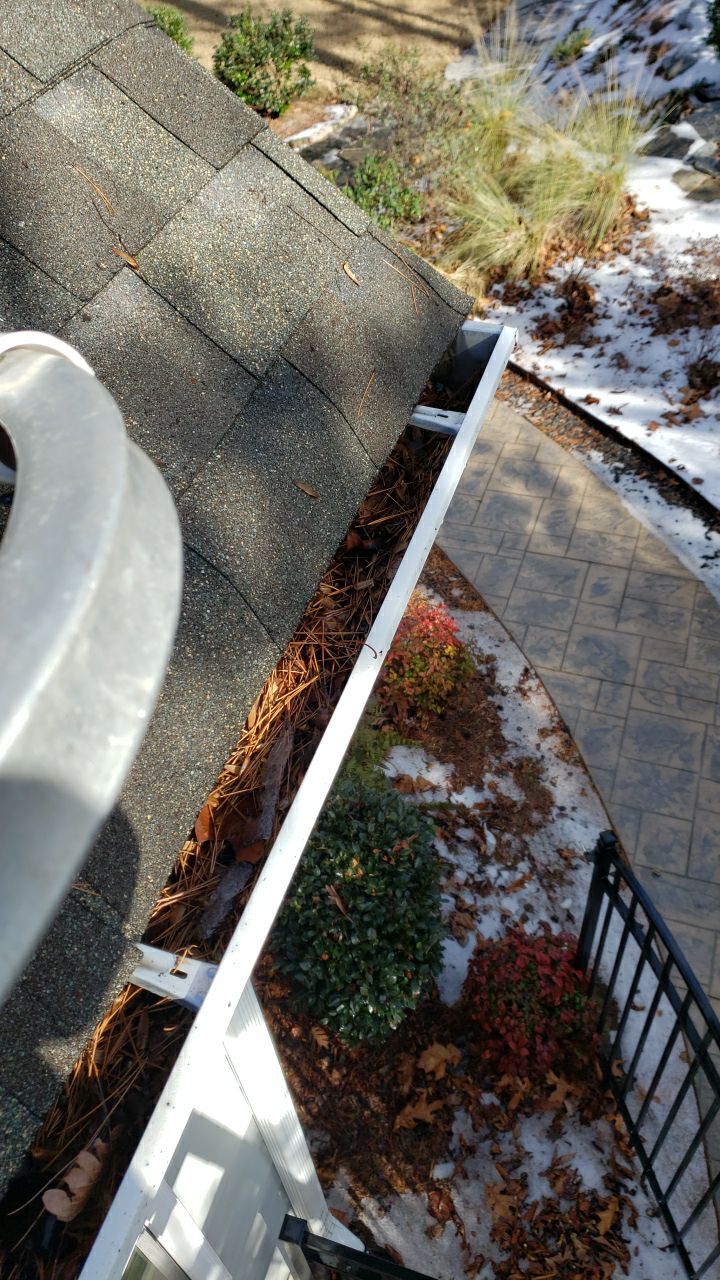 Gutter Cleaning using water by Power Wash Masters LLC