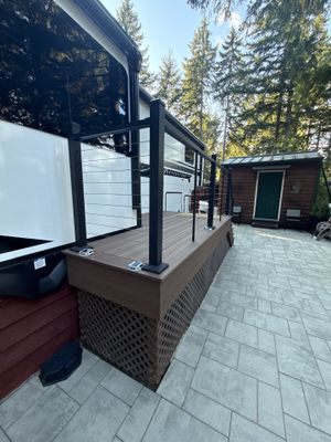 Custom Composite Deck with Cable Railing and Paver Patio in Olympia