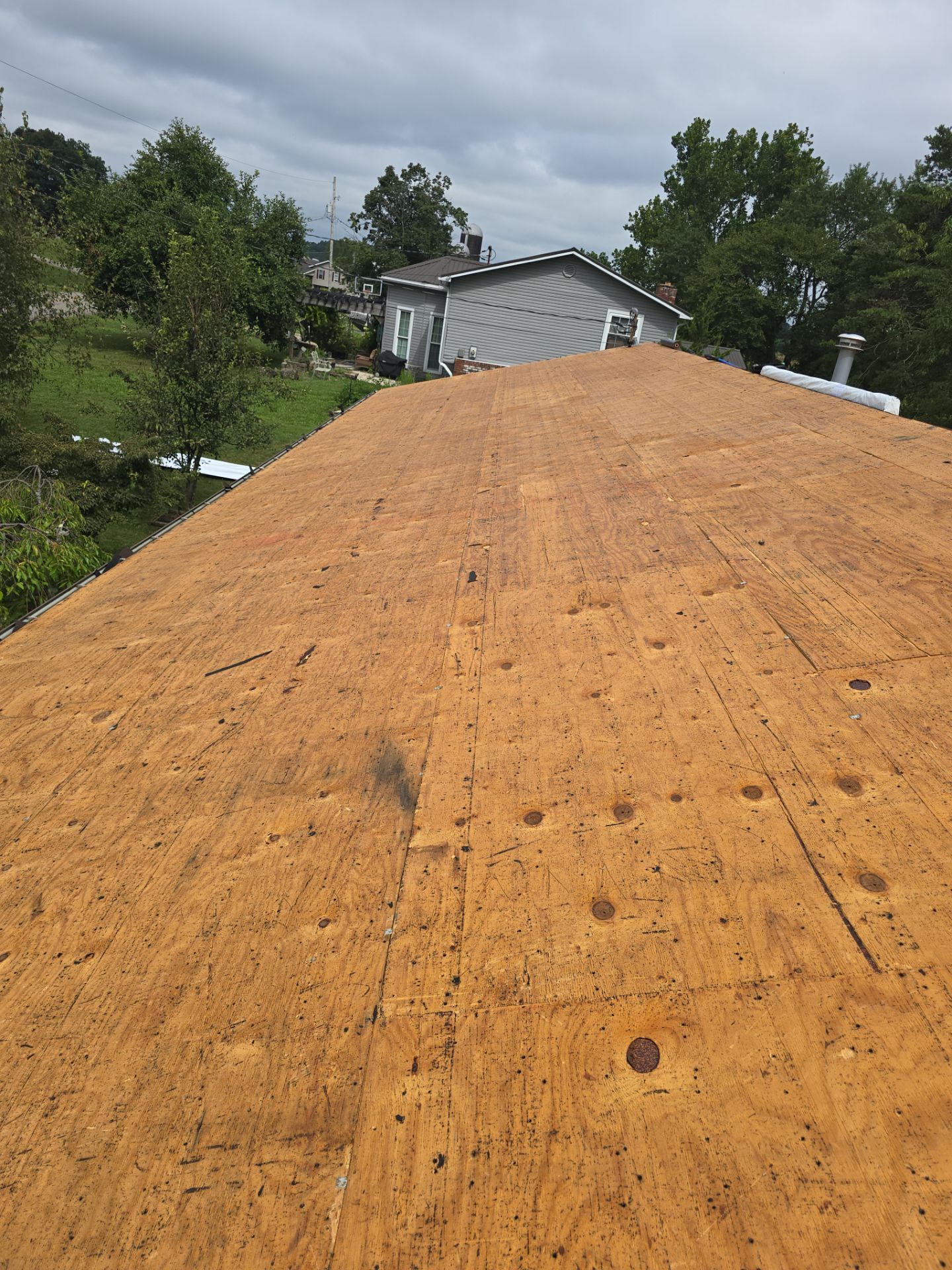 Residential Roofing Installation using Metal by Rainstoppers Roofing
