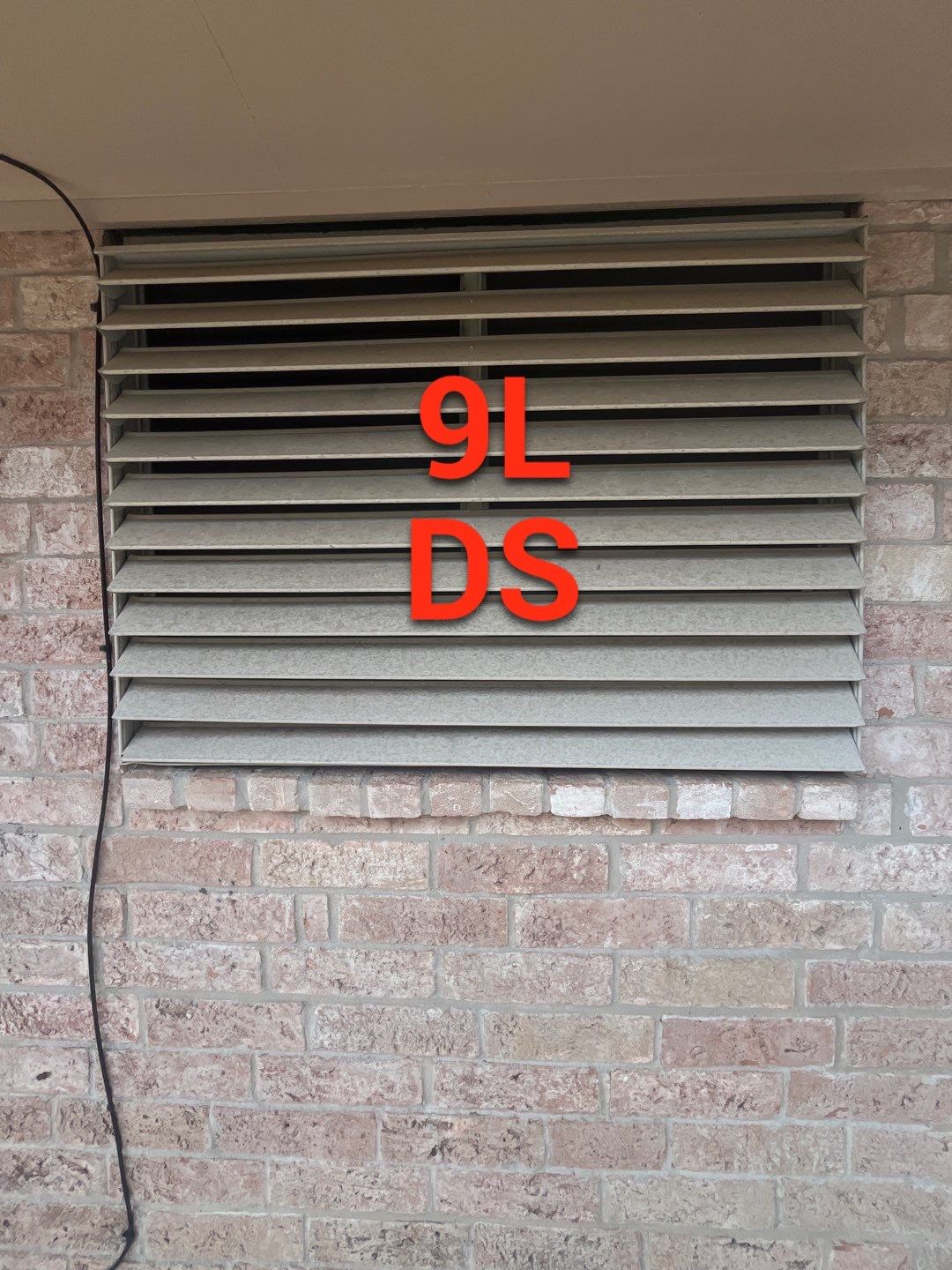 Colored Vinyl Windows to blend into brick by Bayfront Roofing and Construction