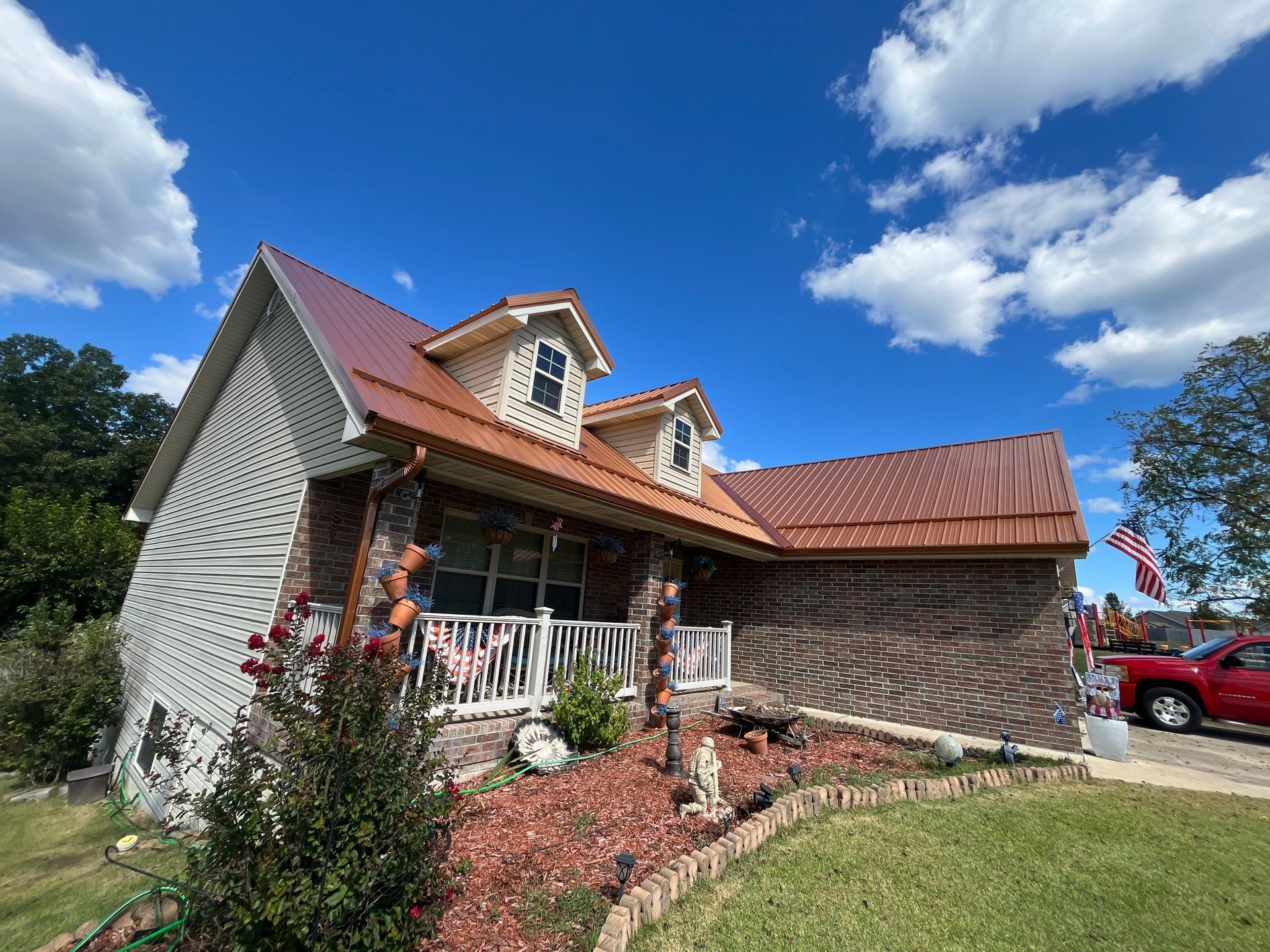 Residential Roofing Install - Copper 29 Guage G-Rib Metal & 6" Inch Seamless Gutters + 3"x4" Aluminum Downspouts  by Titan Commercial & Residential Roofing 