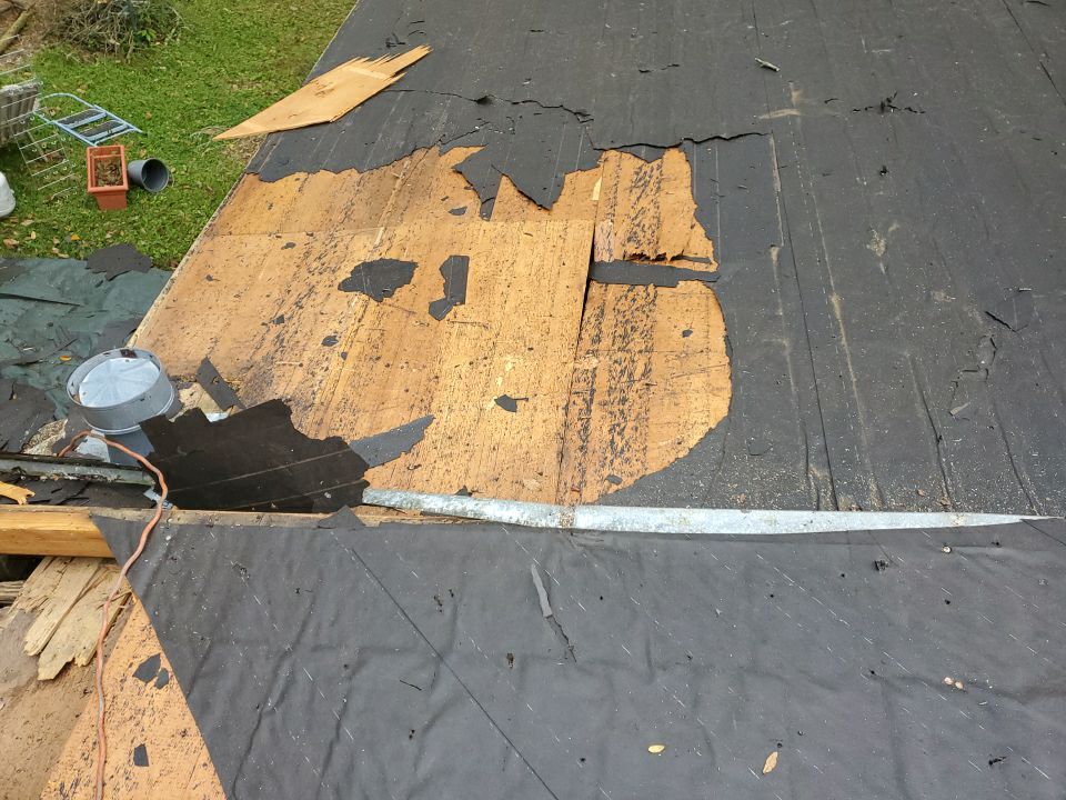 Residential Roofing Installation using Roof Replacement by American Roofing & Construction LLC