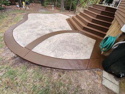 Stamped Concrete and Weathered Deck