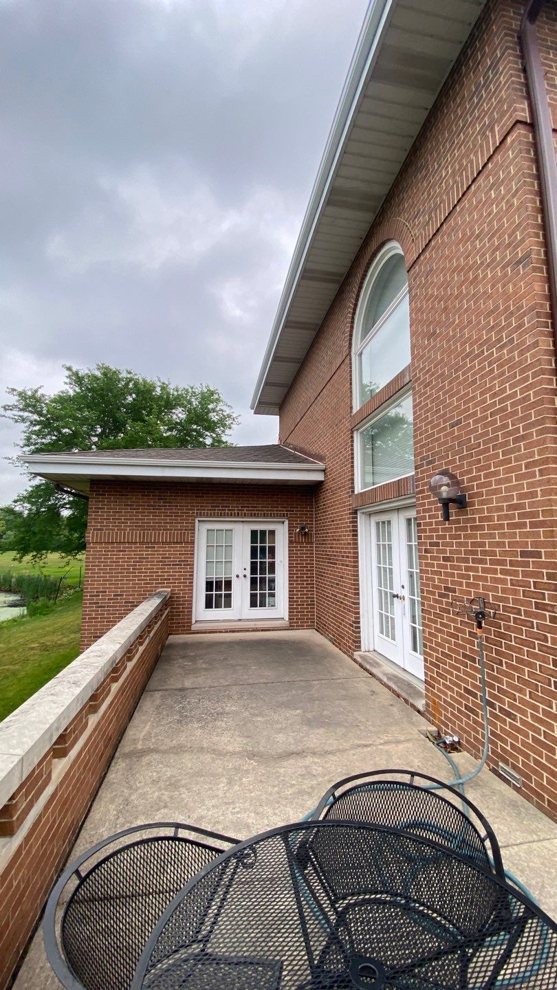 Asphalt Roof Replacement and Aluminum Gutter Installation by Custom Installations