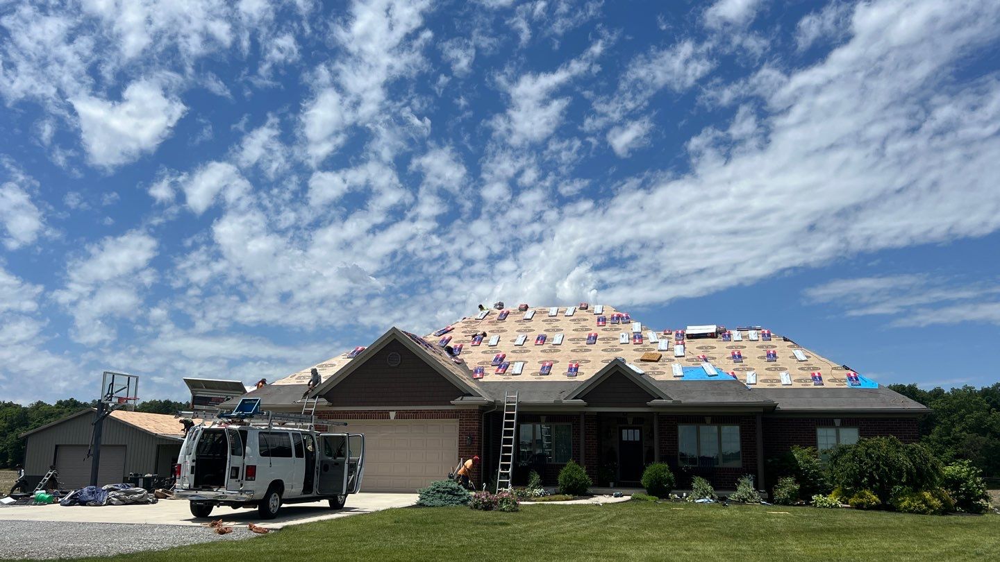 Asphalt roof replacement/ Ag panel roof replacement/ Vinyl siding replacement by Nitro Roofing and Construction
