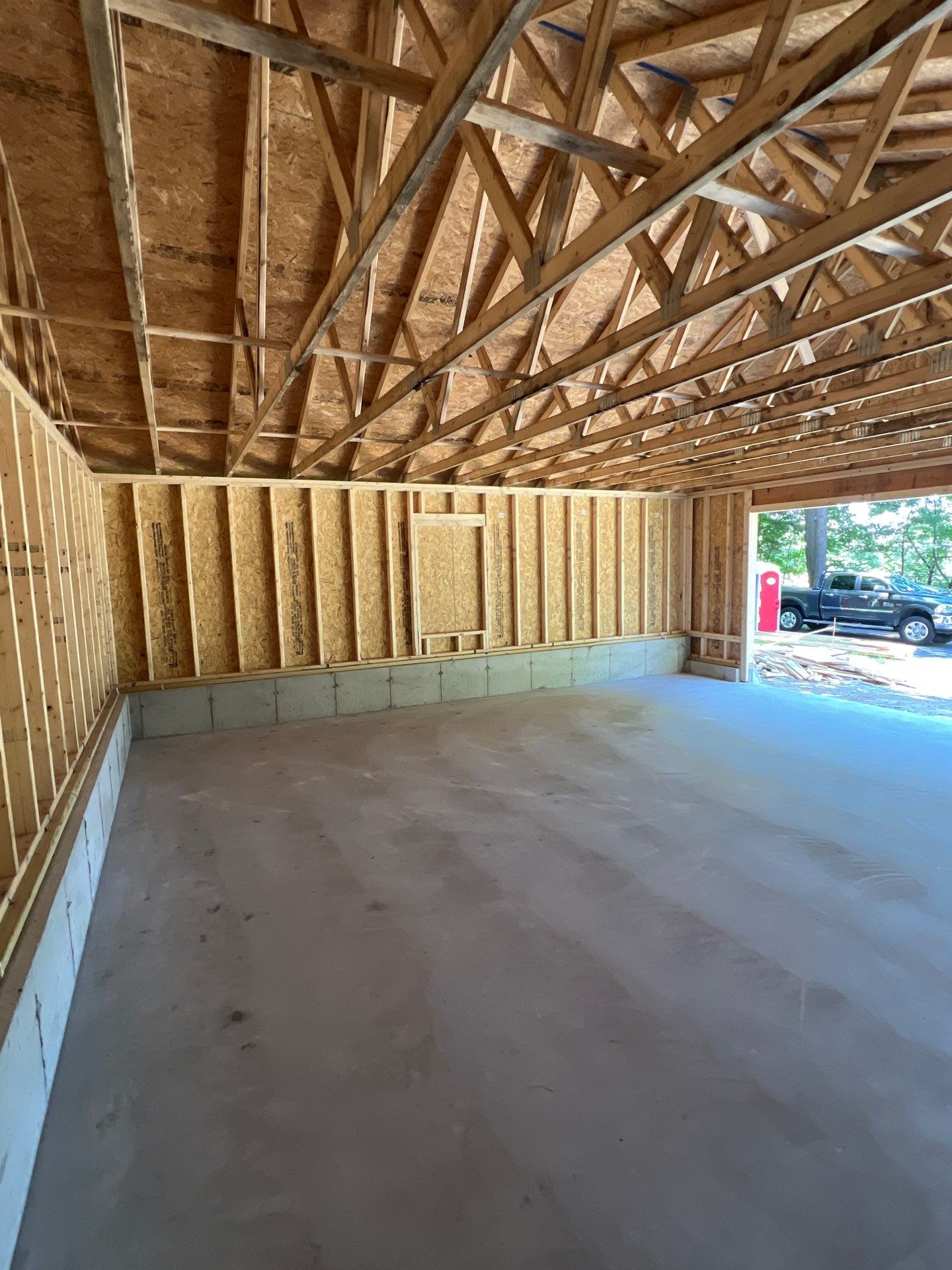 Garage using LP SmartSide Panel Siding by Chagnon Building & Remodeling LLC