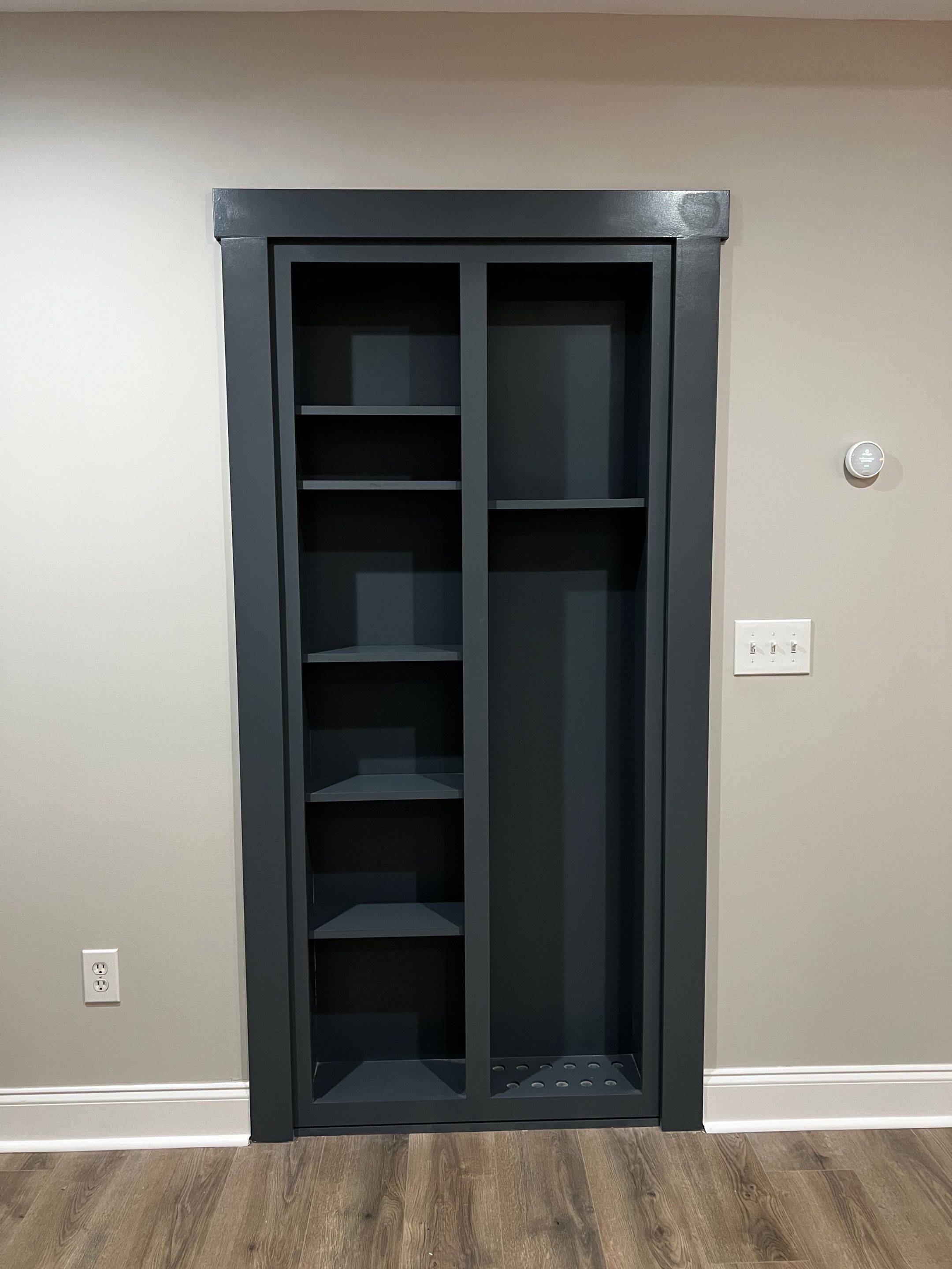 Modern Basement Remodeling in Woodstock with Custom Live-Edge Bar by Swift Home Renovations