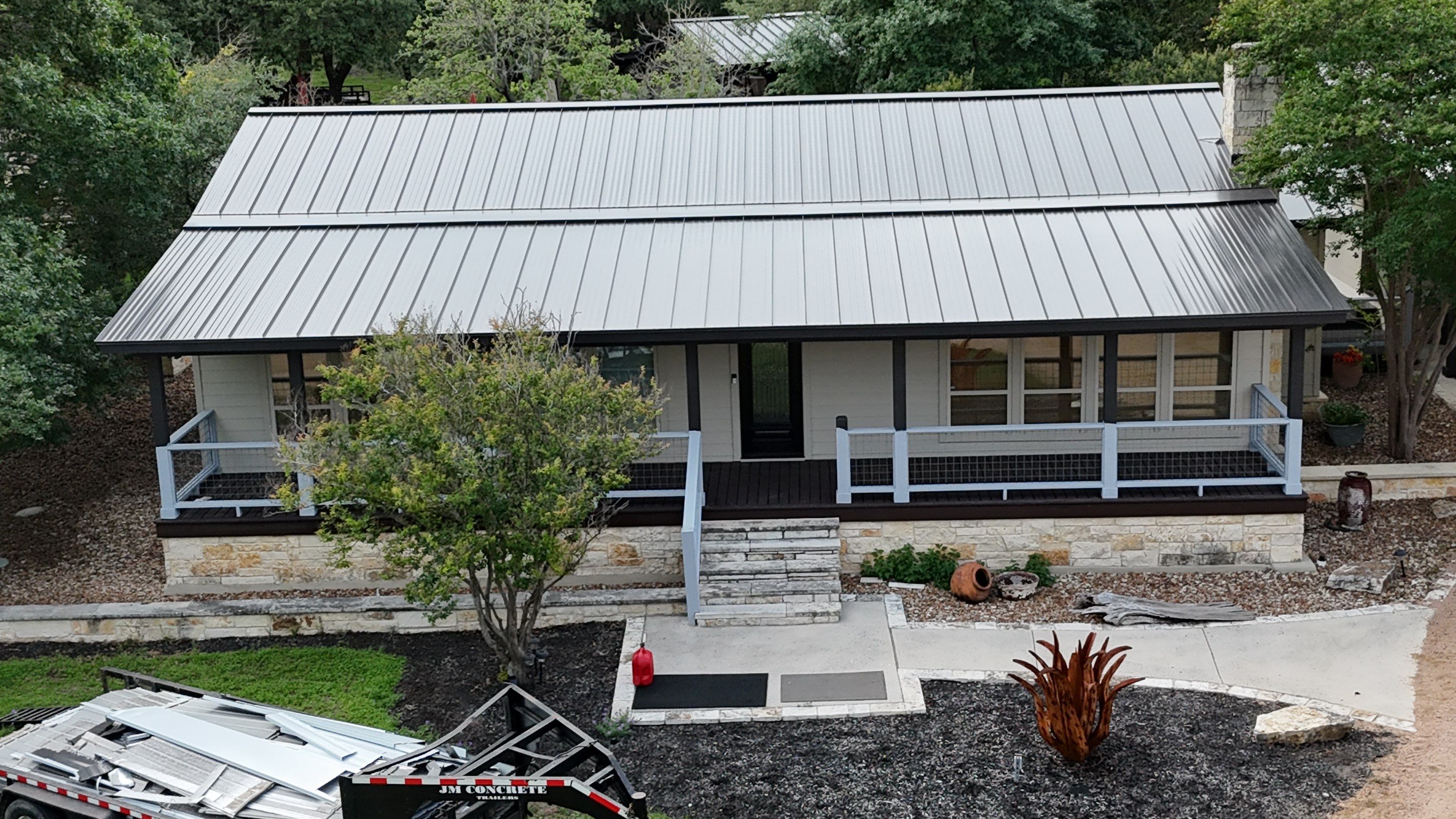 Dark Bronze Fully Striated panel by Wimberley Roofing