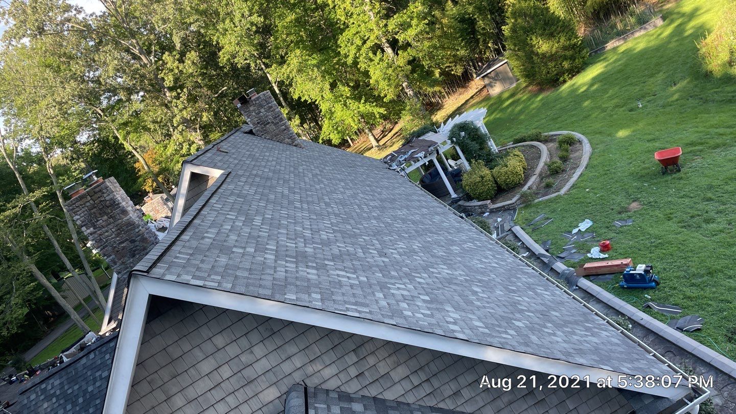 Roof Replacement using IKO Dynasty by American Home Contractors