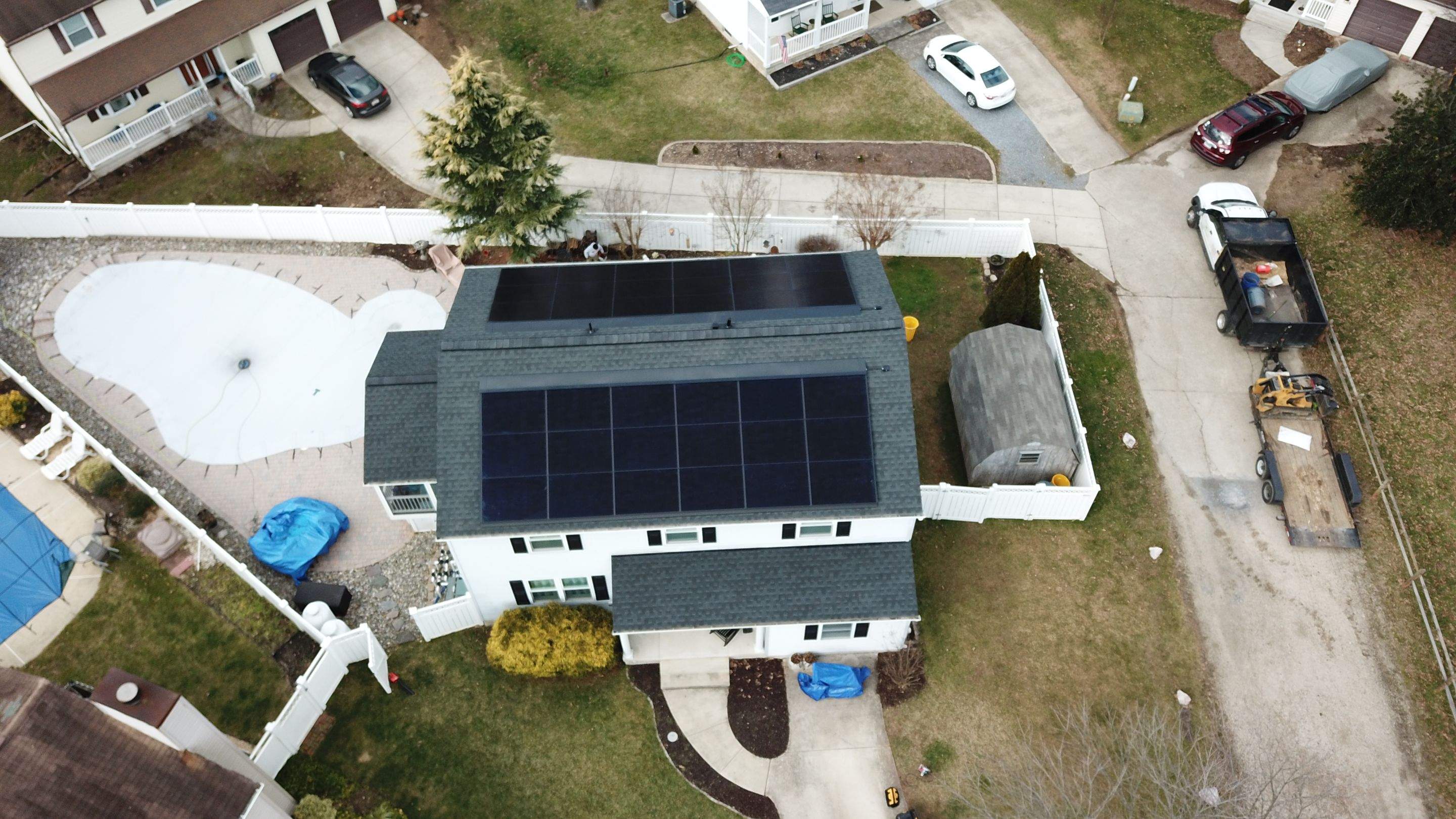 Roof Replacement with GAF Decotech integrated solar panels by American Home Contractors