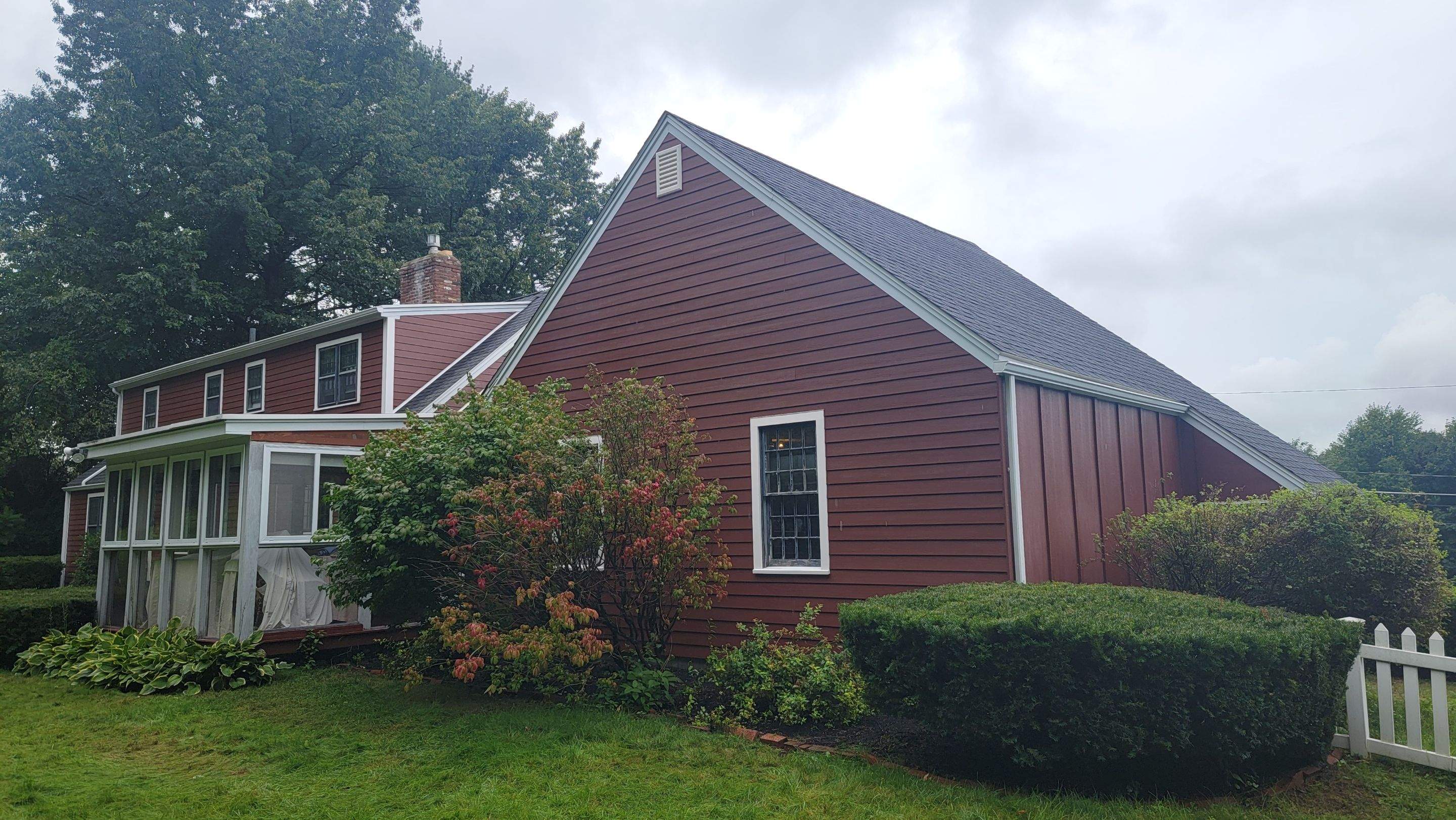 Siding Installation using James Hardie Countrylane red by UBrothers Construction