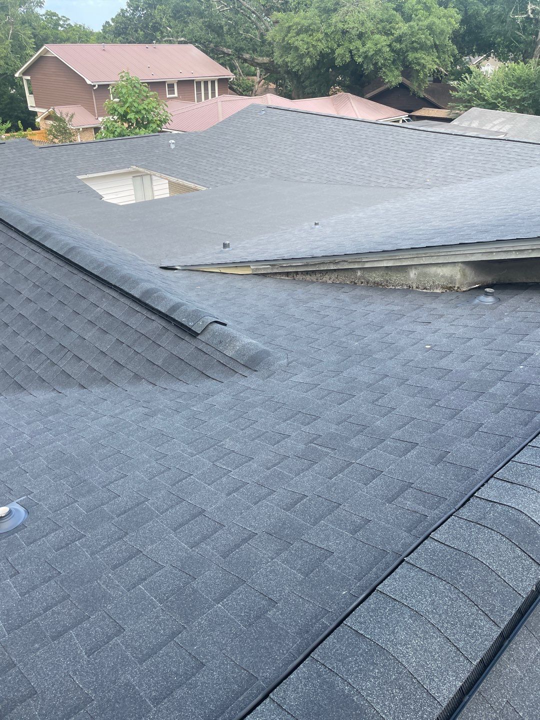Residential Roofing Installation using Roof Replacement by American Roofing & Construction LLC