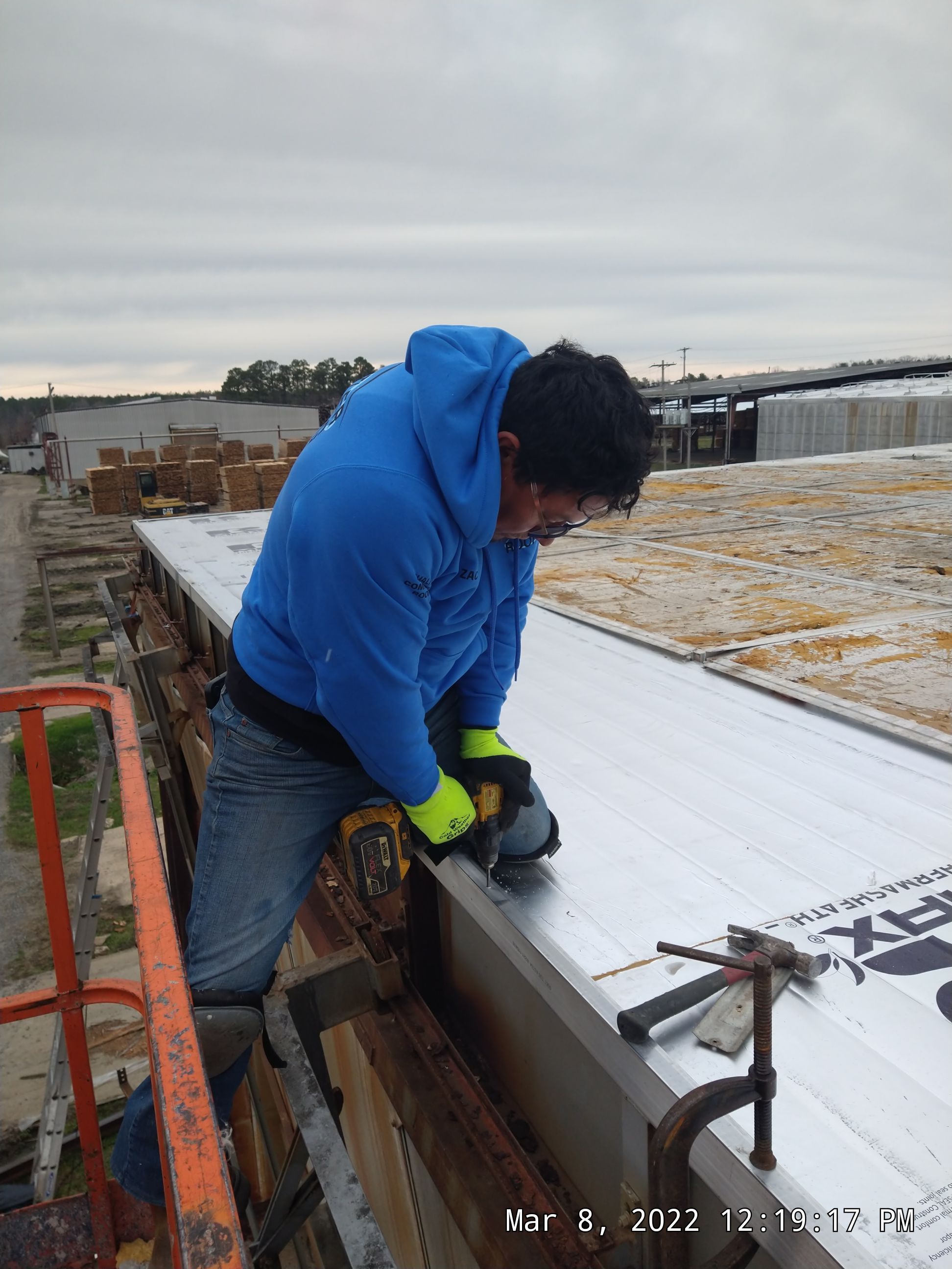 Commercial Roofing Installation using Aluminum Roofing panels by Hostetler Roofing