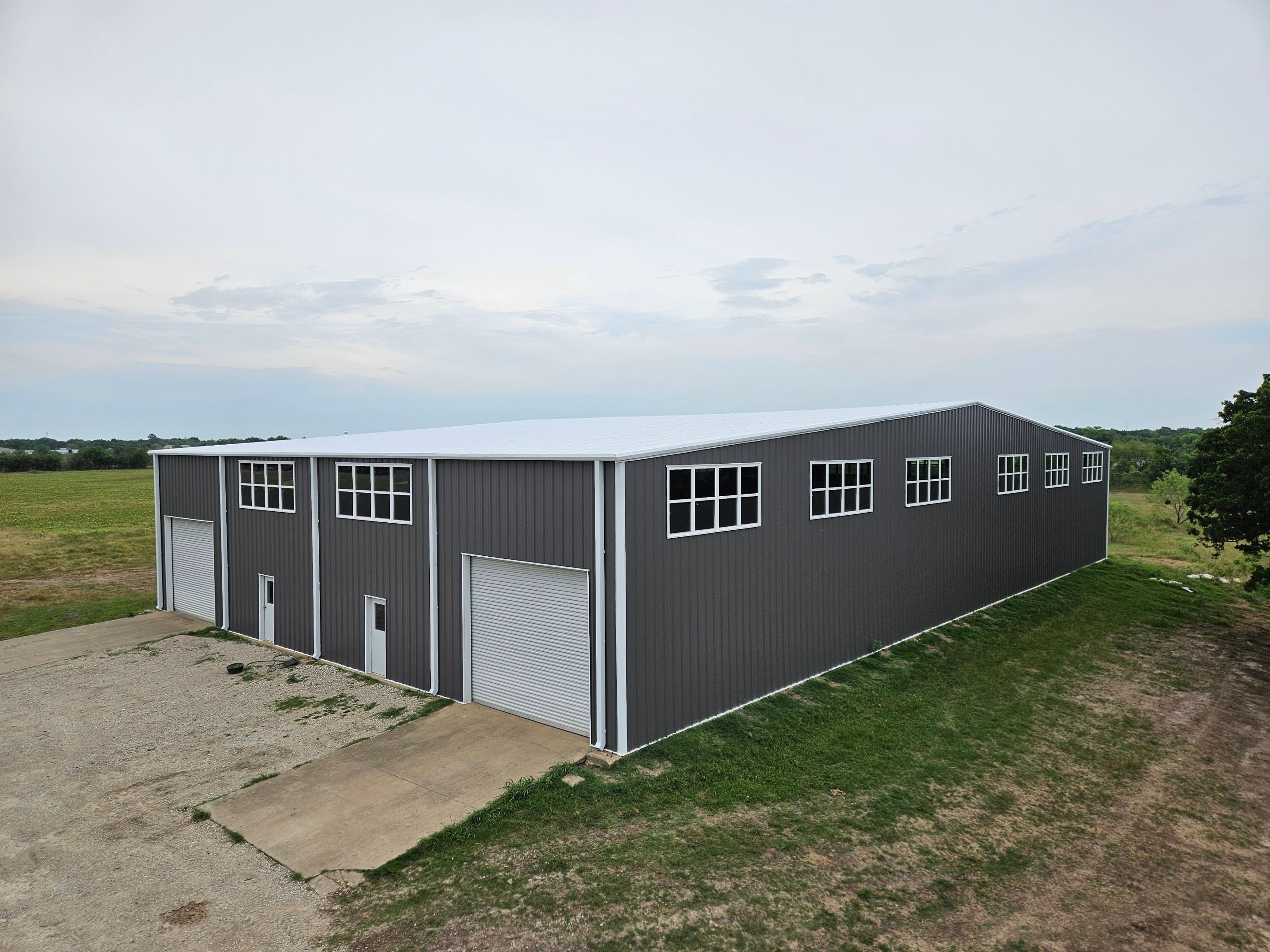 Complete Restoration with Skylight/Window Install - Greenville, TX by Hostetler Roofing