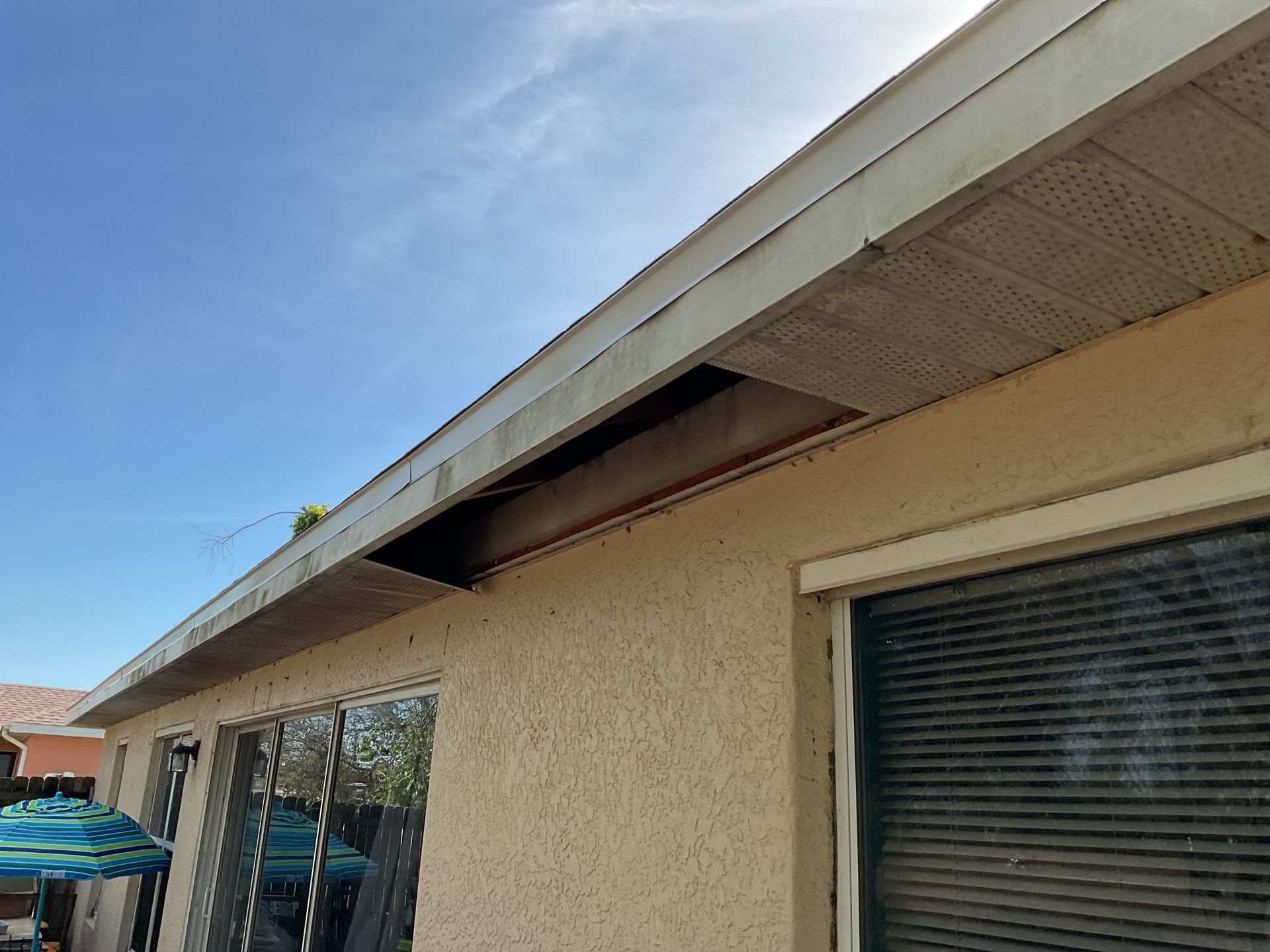 White Seamless Gutters and Soffit Installation in Cape Coral FL by Gutter Professors