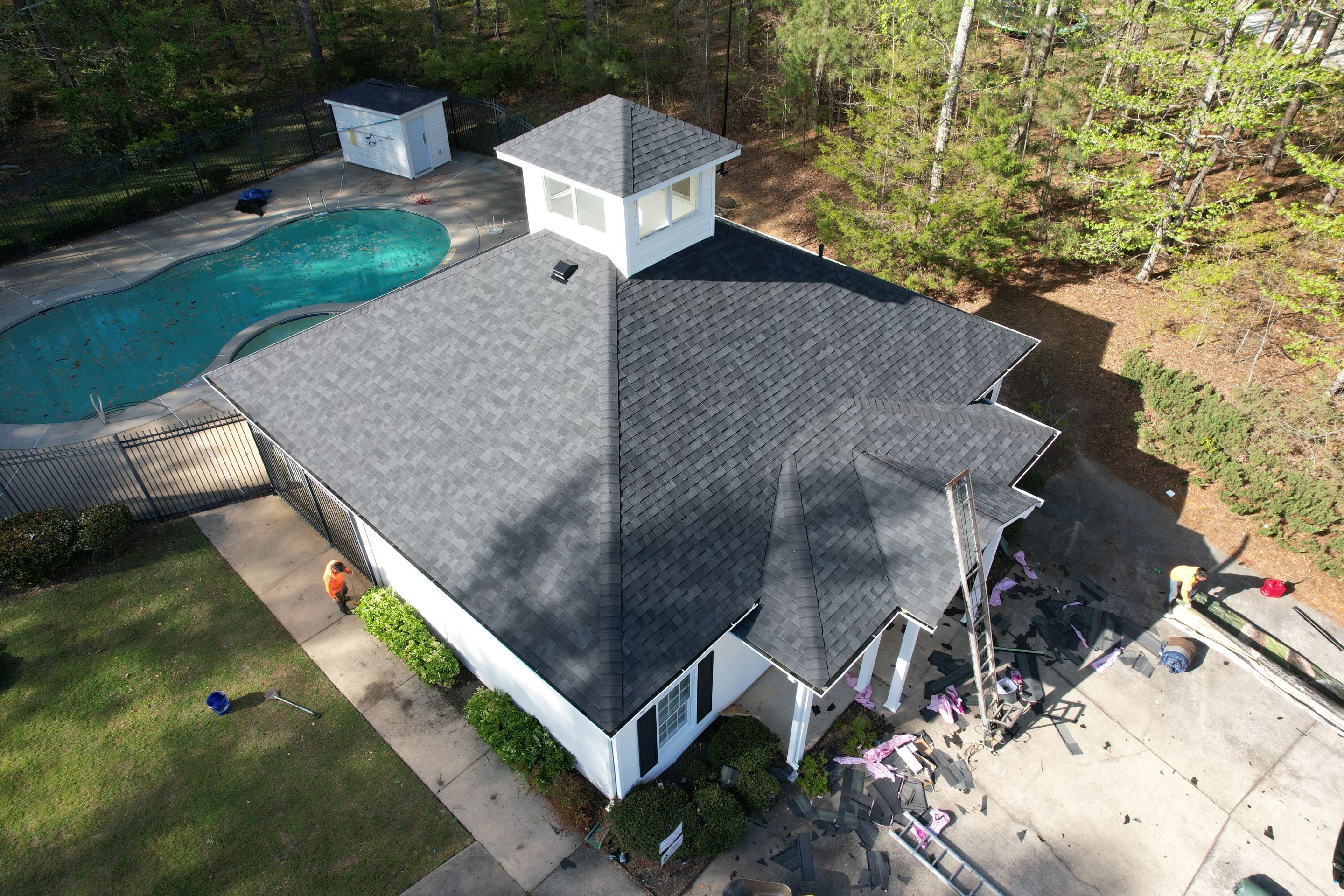 Pool House Roof Replacement using Owens Corning Onyx Black by Inspector Roofing and Restoration
