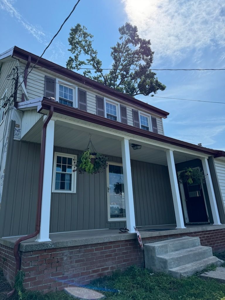 Metal Roof-coloniel red- and new siding by Esh Builders