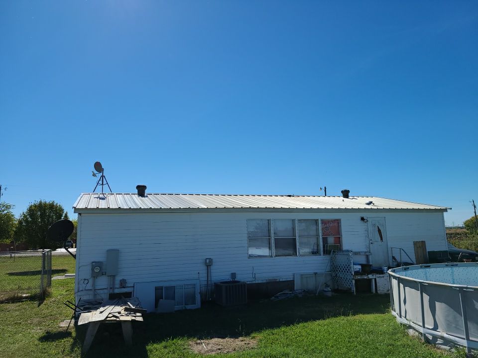 Residential Roofing Repair using PBR Metal Roof by Harvey Roofing & Construction