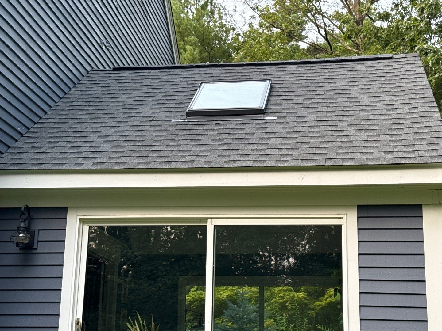 Solar-Ready Roof Replacement with GAF Pewter Gray Shingles & VELUX Skylights by Sensible Home Solutions