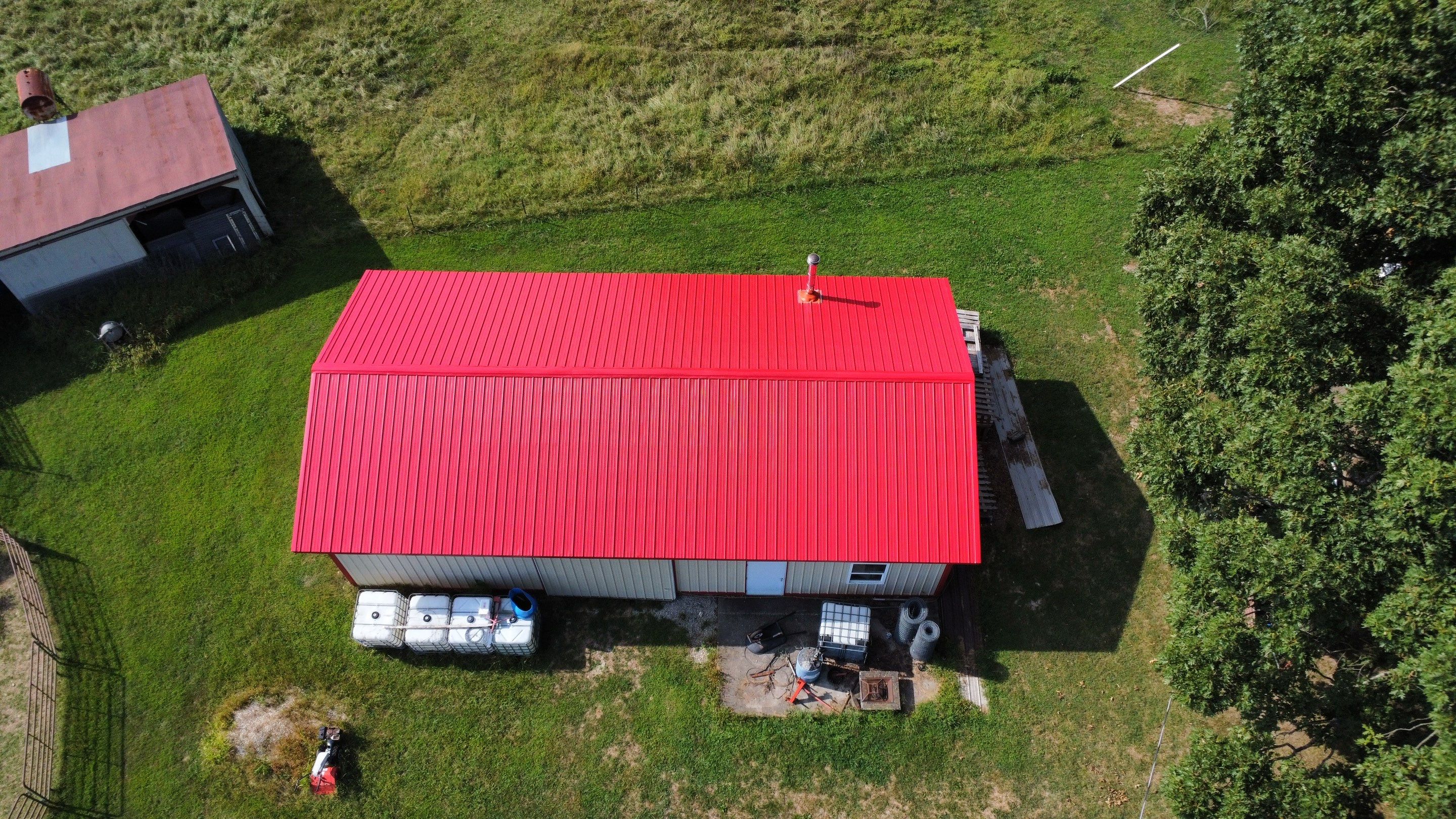 Residential Roofing Install - 29 Gauge G-Rib Metal - Color Brown & Crimson Red by Titan Commercial & Residential Roofing 