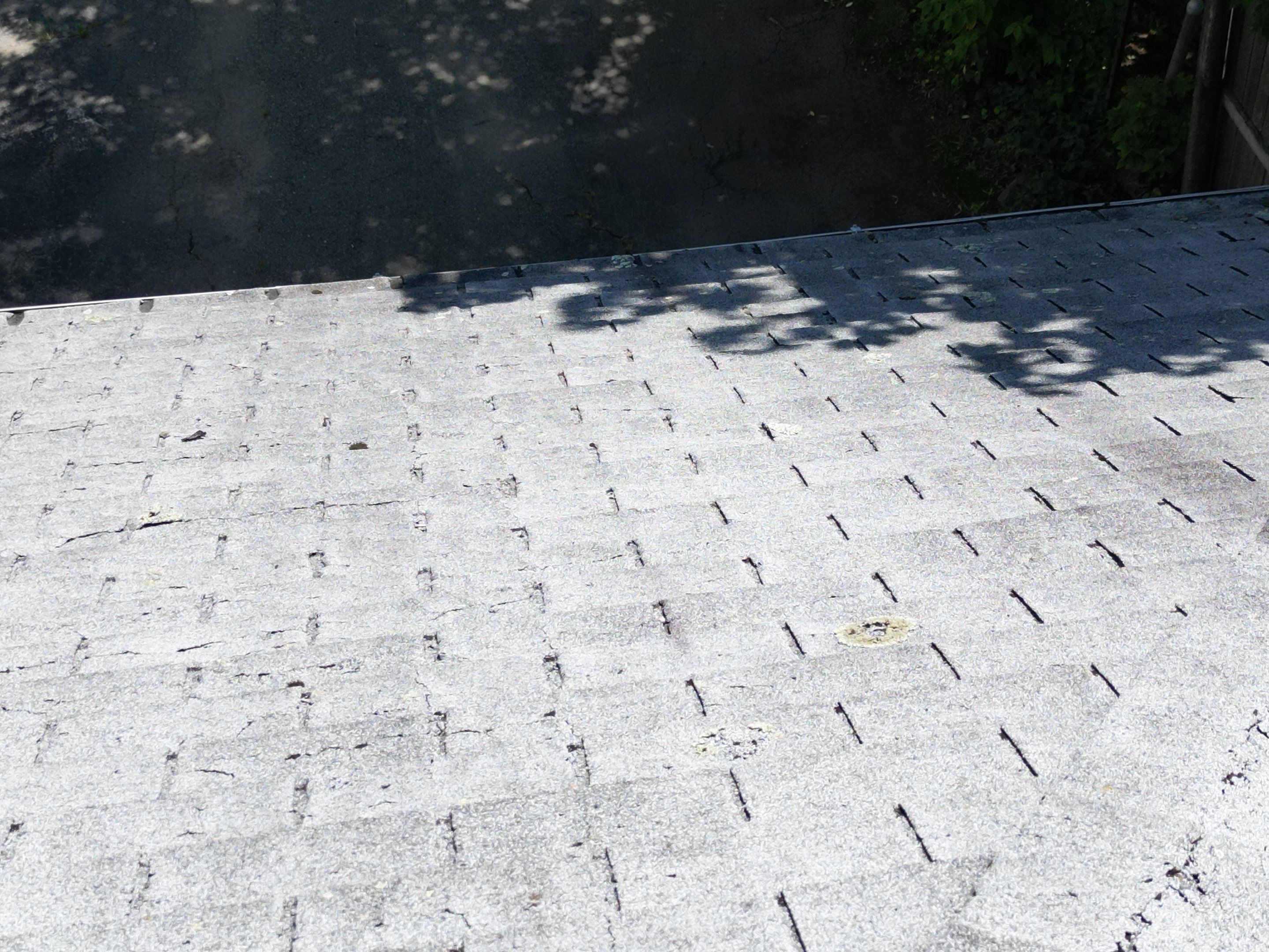 Roof Replacement with Skylight Flashing in Waltham, MA by Mighty Dog Roofing of Greater Middlesex County