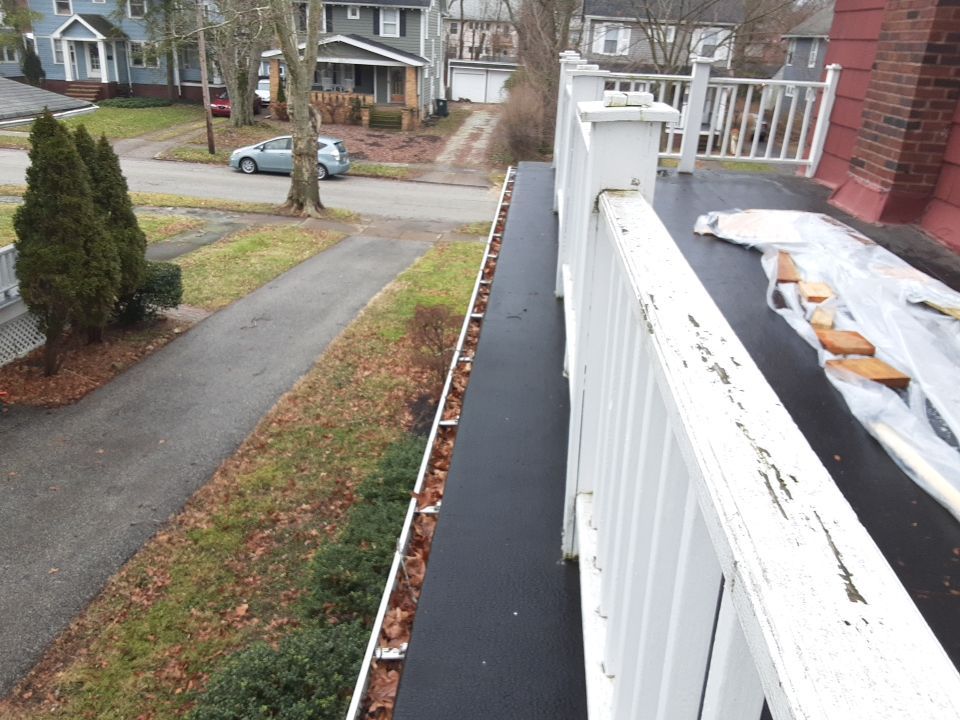 Residential Roof Replacement using Patio Roof by Absolute Roofing and Construction