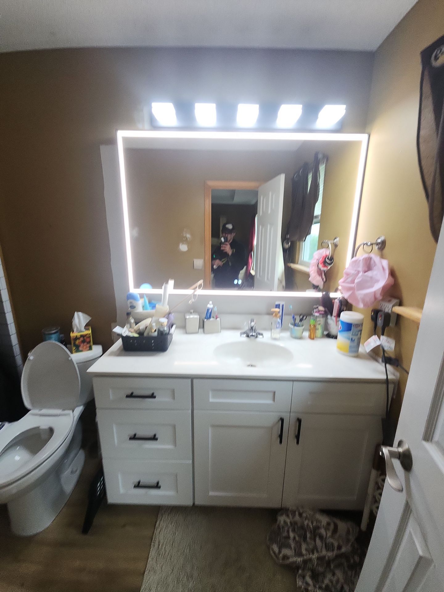 Bathroom Remodel using Luxury Vinyl Plank by The Shower Company