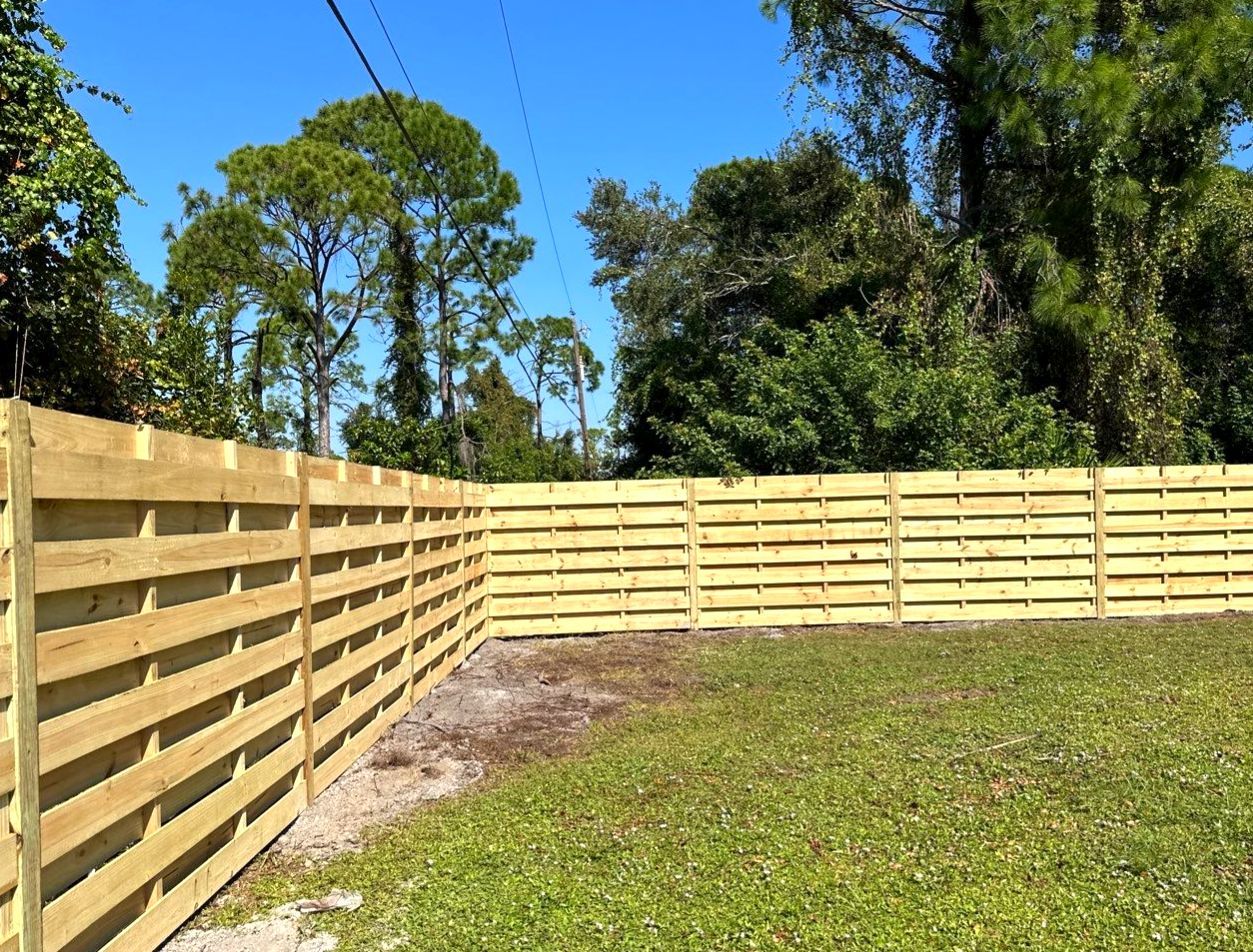 Wood Fence Installation using 6 Ft. Tall Pressure Treated Wood Shadowbox Fence by Asap fence and gates, LLC