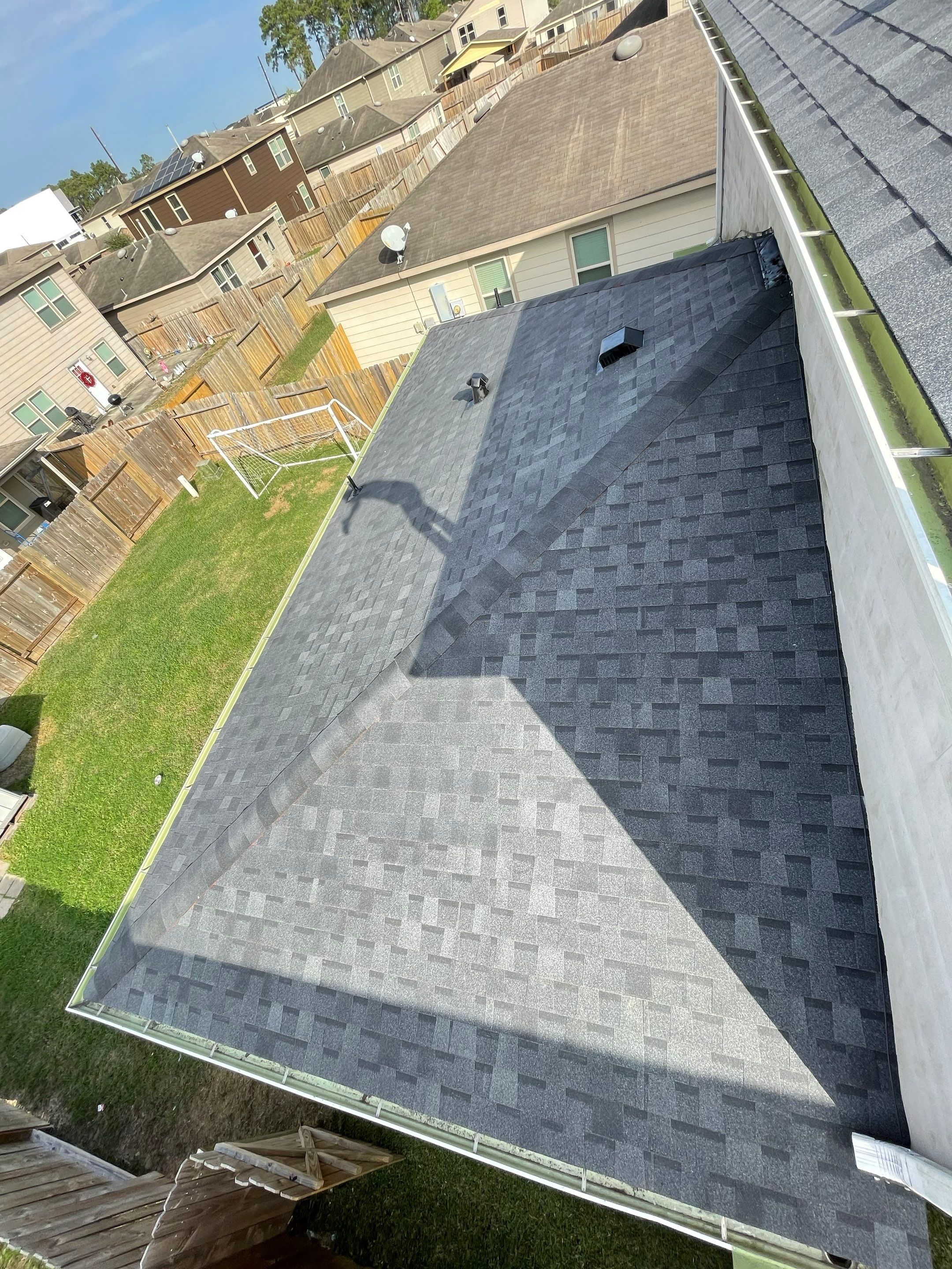 Residential Roofing Installation using Atlas ProLam® Shingles Black Shadow Color by CAP Roofing and Construction LLC