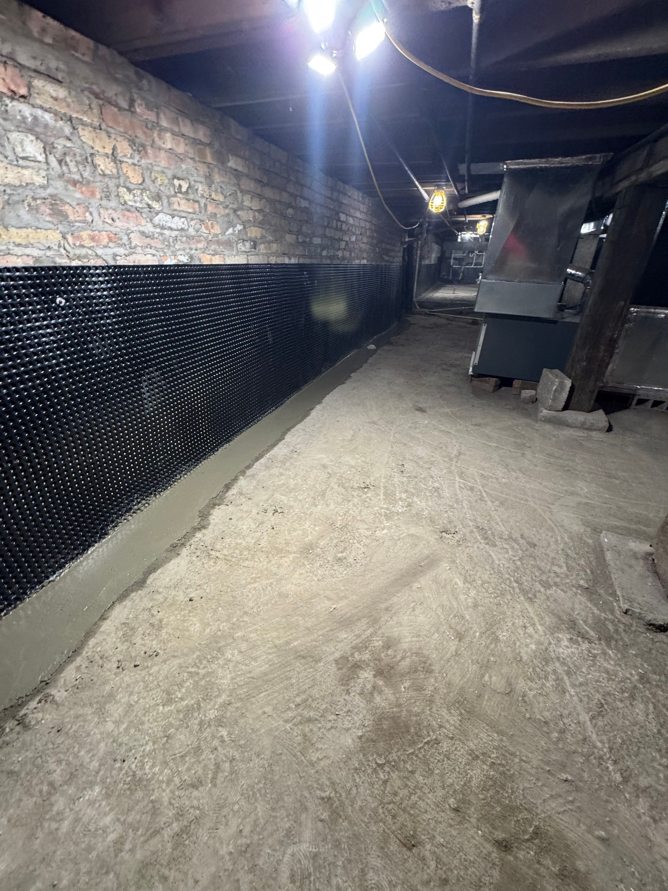 Chicago Drain Tile System by Area Wide Waterproofing