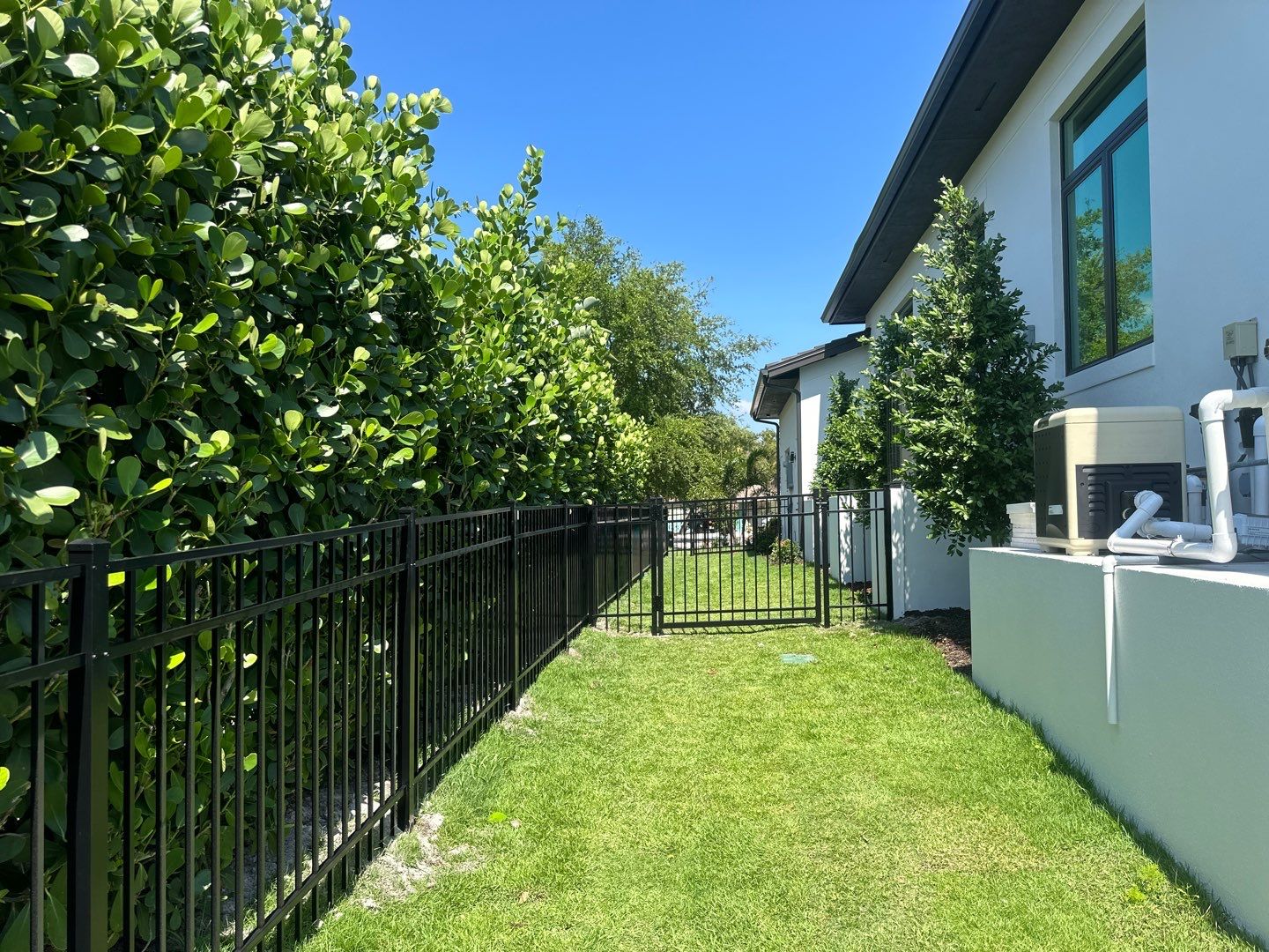 Aluminum Fence Installation using Black 3 Rail Aluminum Fence by Asap fence and gates, LLC