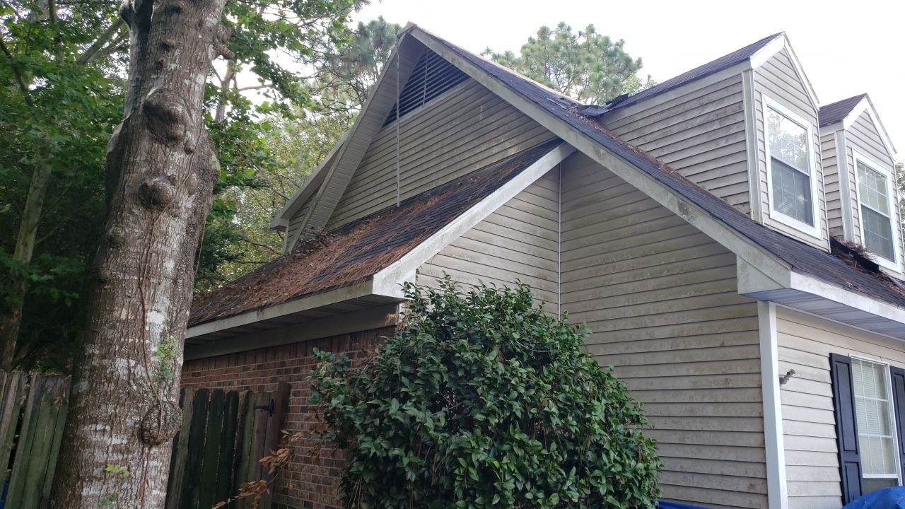 Residential Roofing Installation using Roof Replacement by American Roofing & Construction LLC