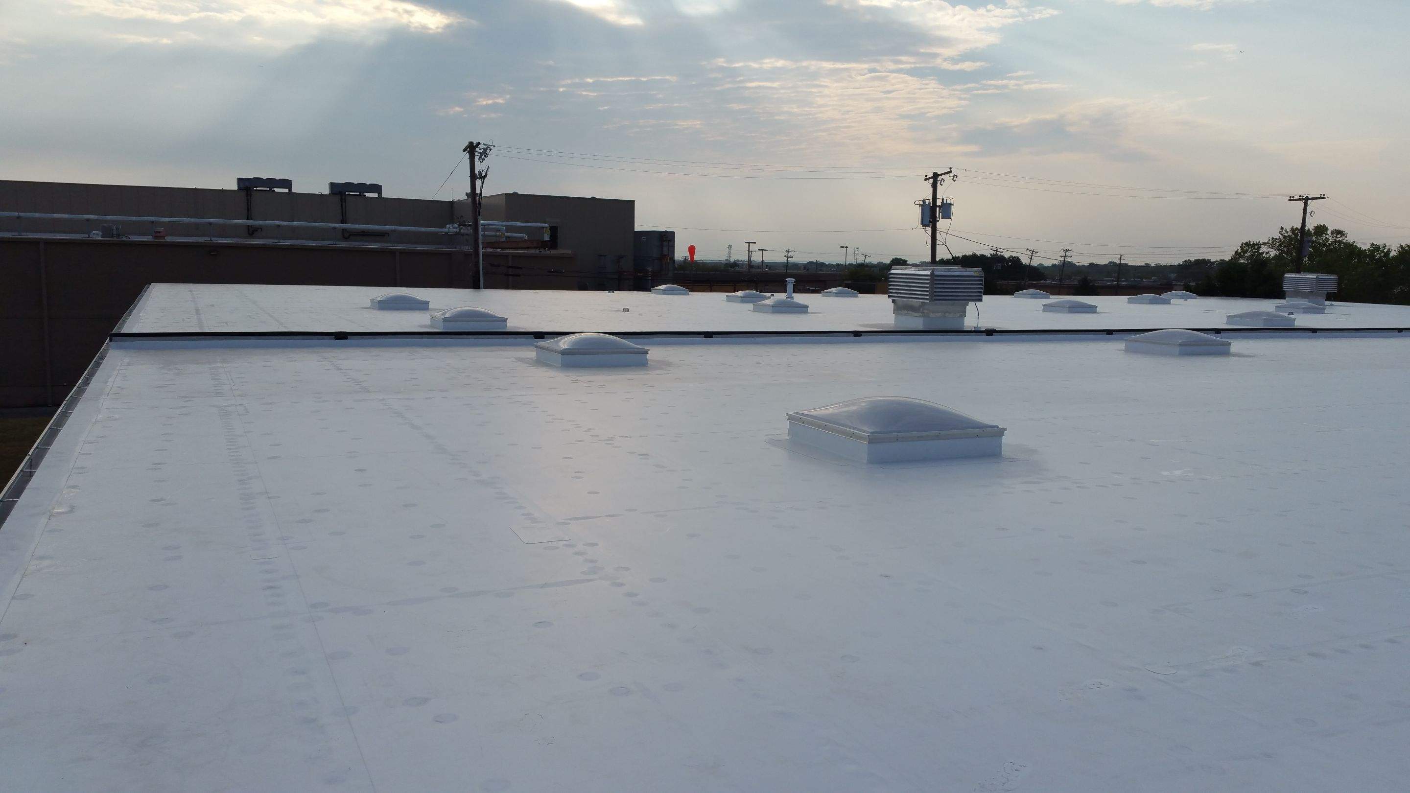 Massive Storm Damage Project - Factory in Arlington by First United Roofing & Construction