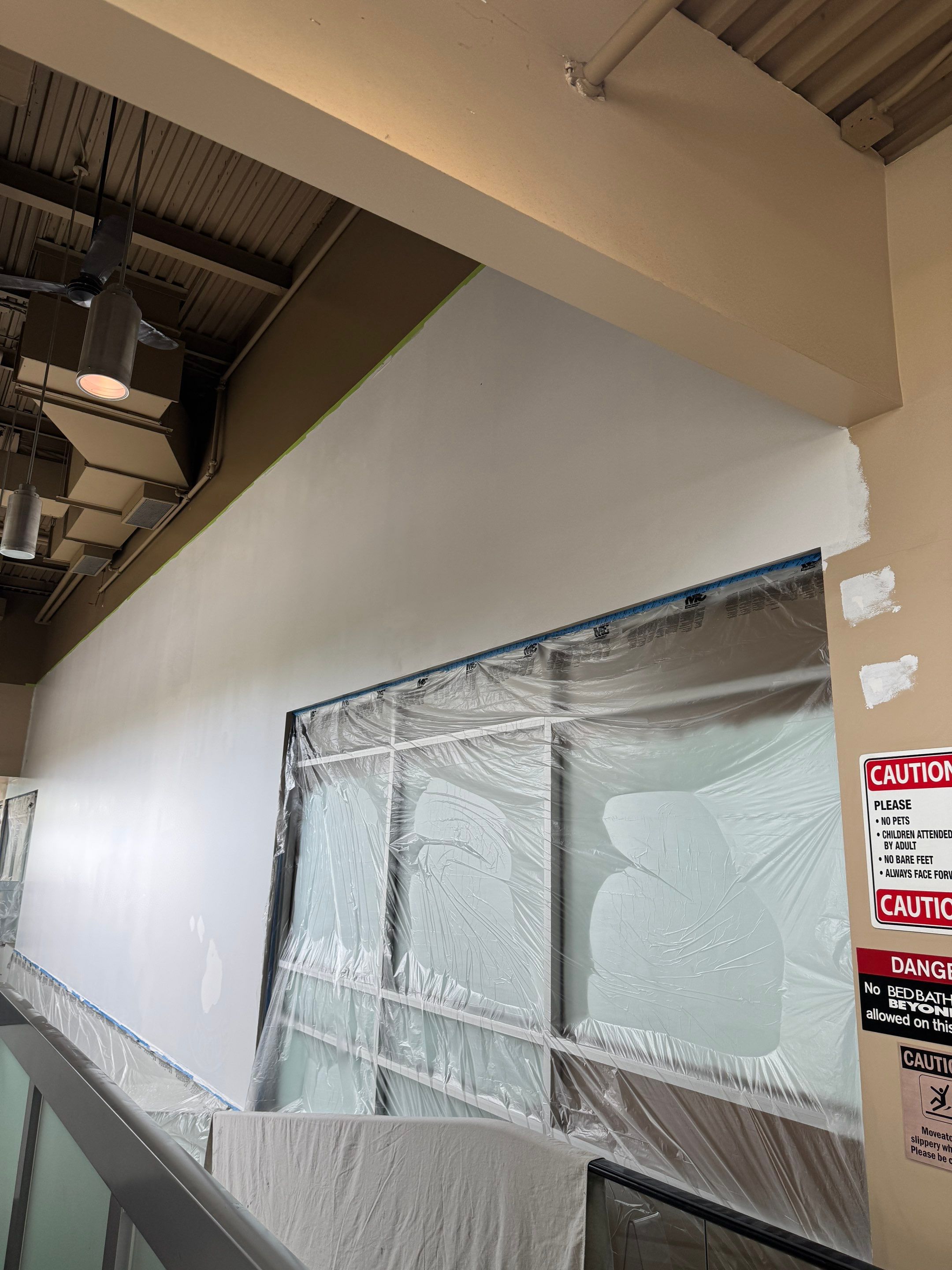 Commercial Prime & Paint Project-30ft height by YVR Construction Group