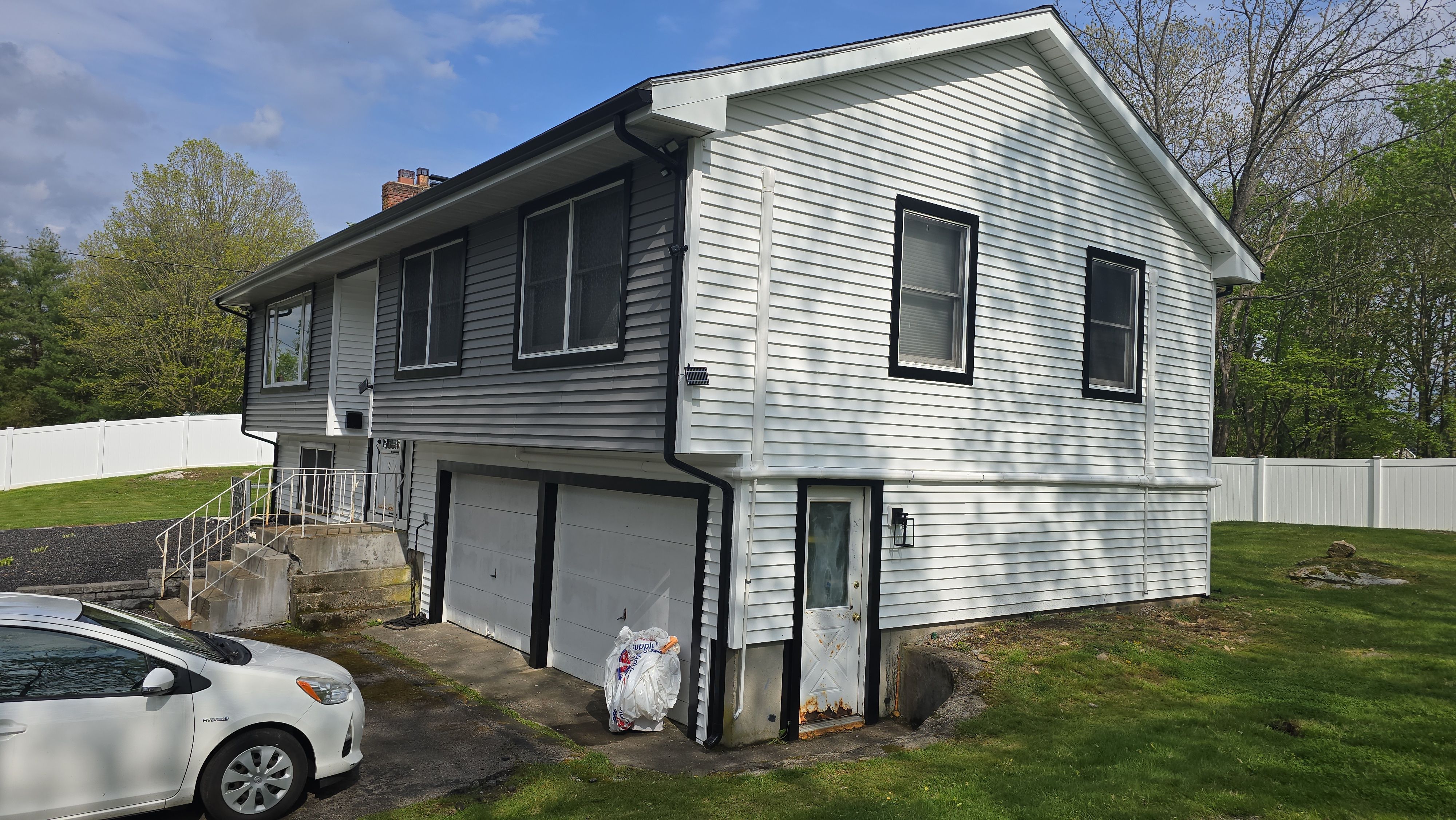 Vinyl siding project in Natick, MA by UBrothers Construction