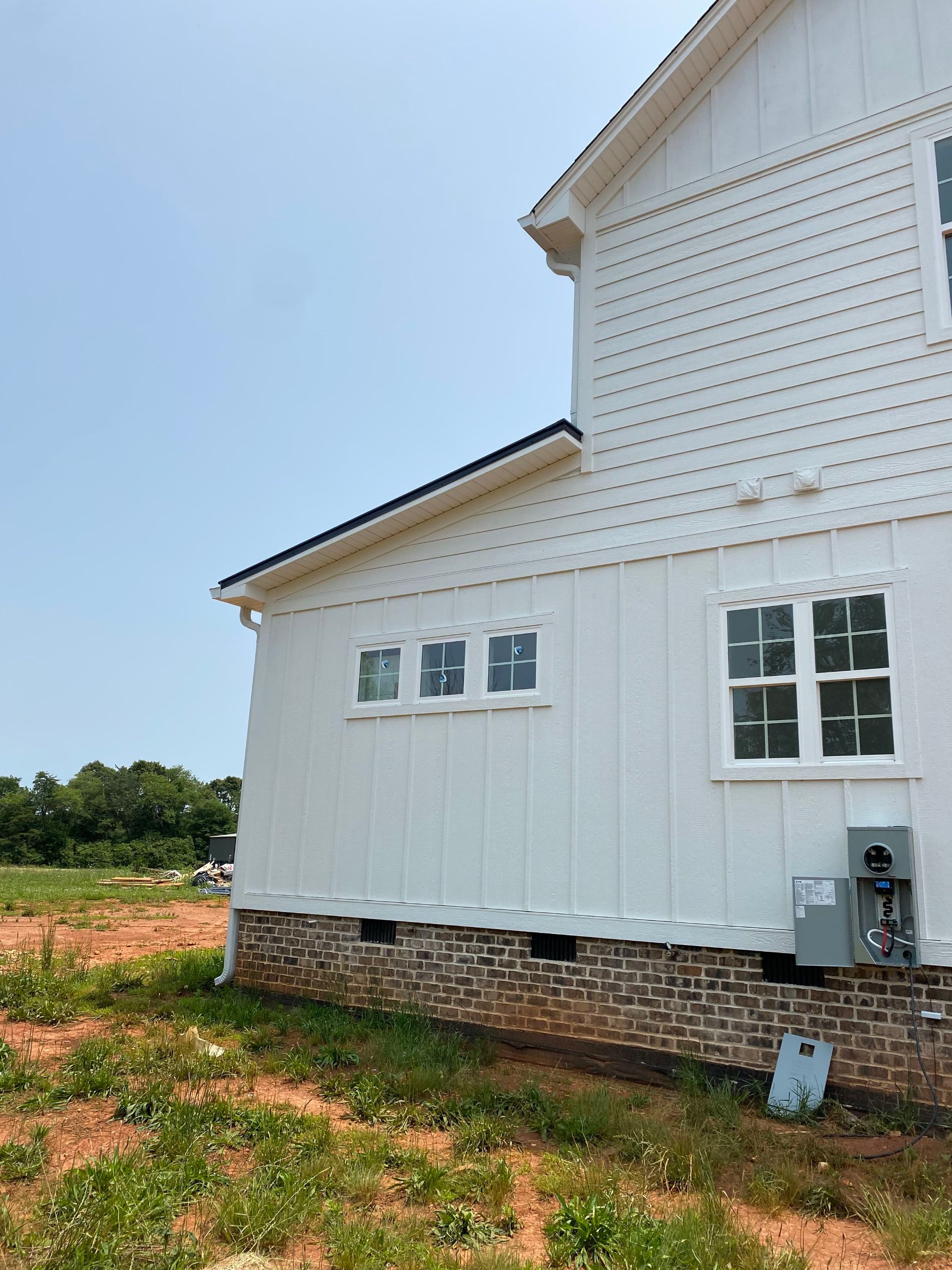 Jason's metal porch roof by BROCK BUILDERS 