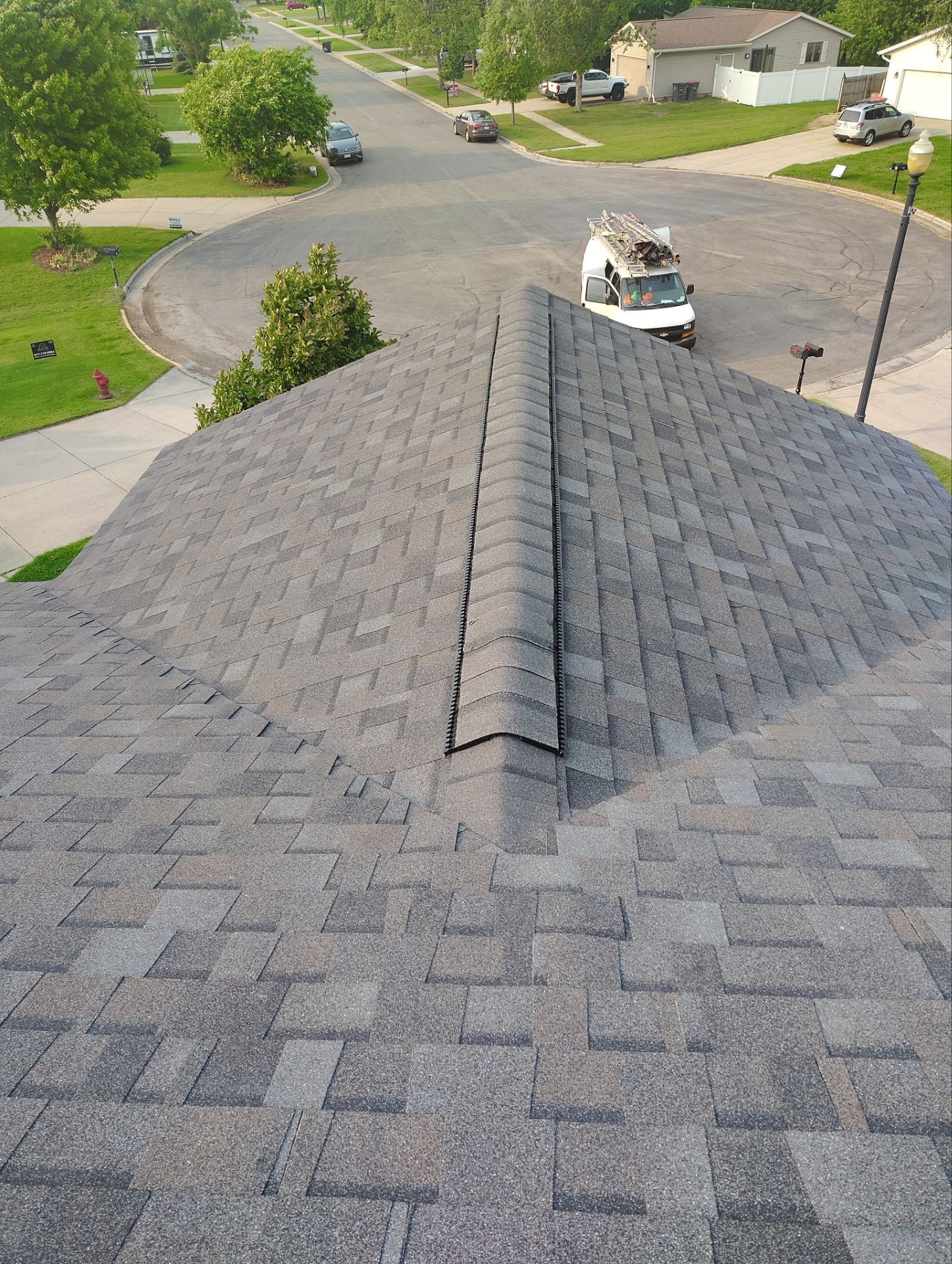 H.F.: Roofing and siding by AFC Exteriors