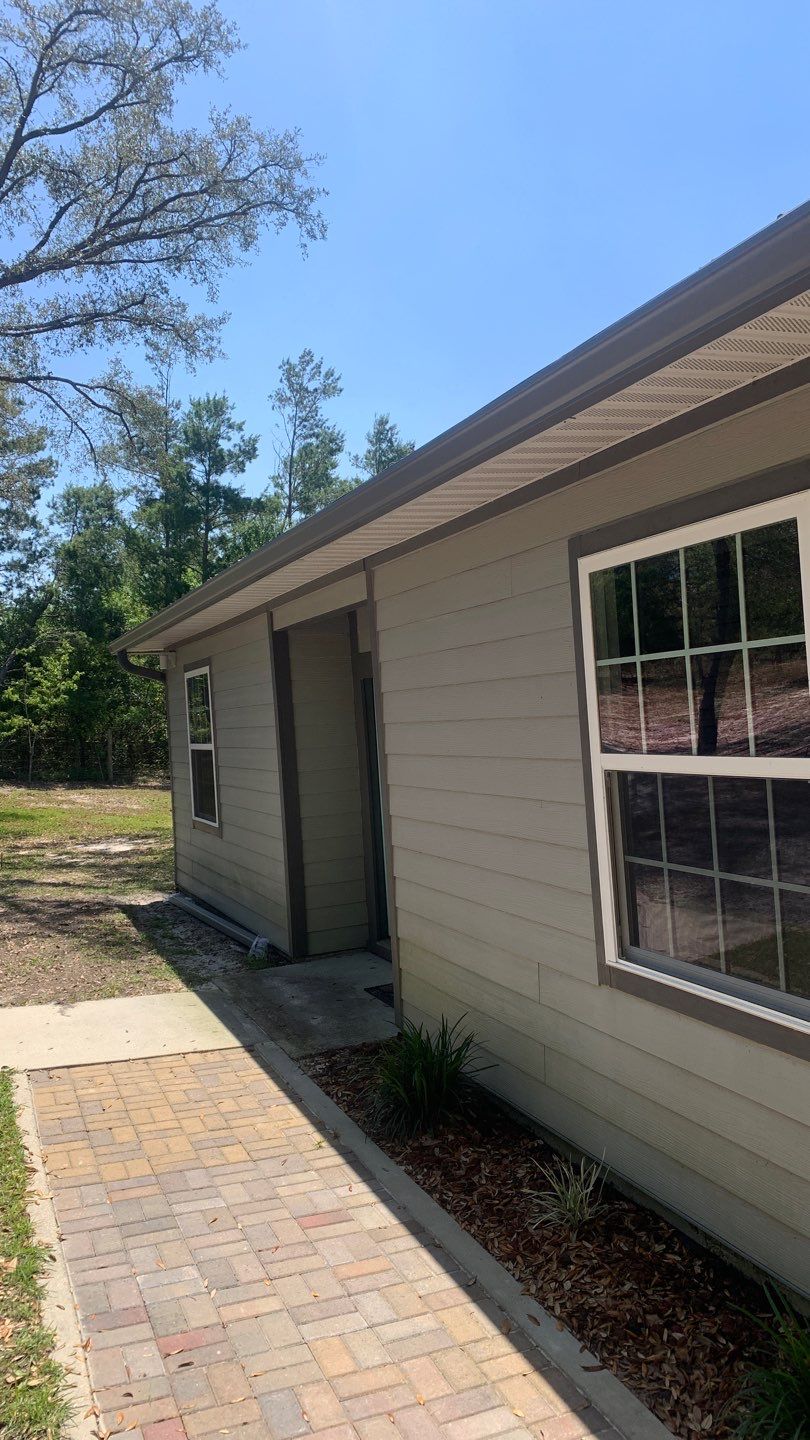 Gutter Installation Using Charcoal Grey K-Style Seamless Aluminum Gutters by Gutter Professors