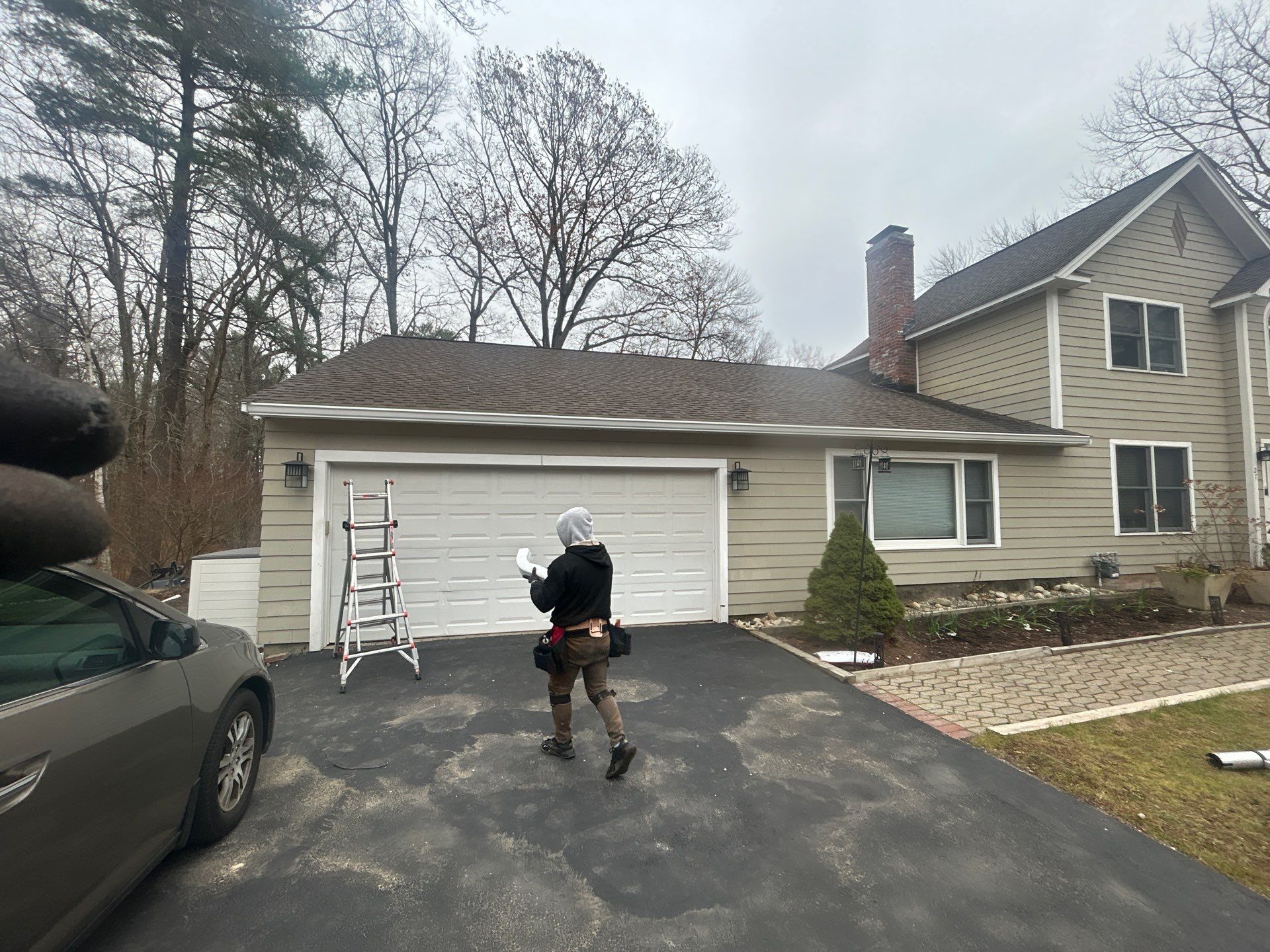 Chelmsford Garage Gutter System with French Drain Integration by Mighty Dog Roofing of Greater Middlesex County