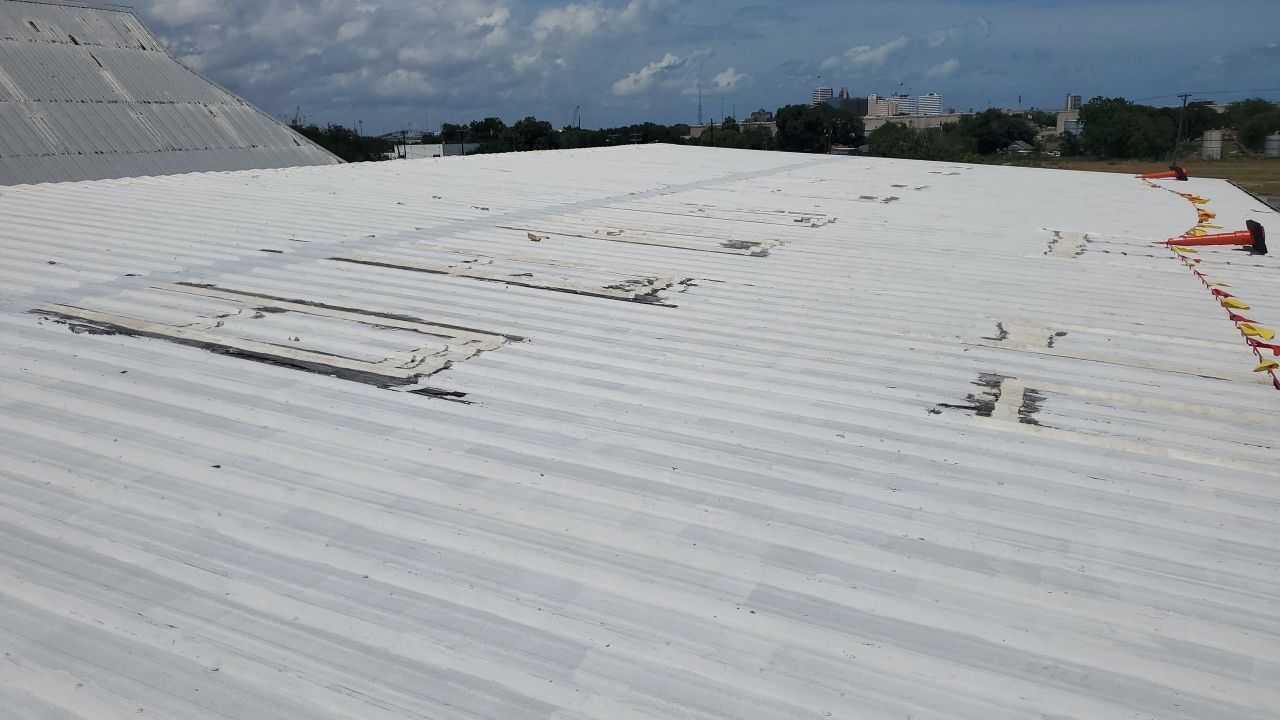 Commercial Roofing Installation using GAF 10 Year Acrylic System by Lighthouse Roofing