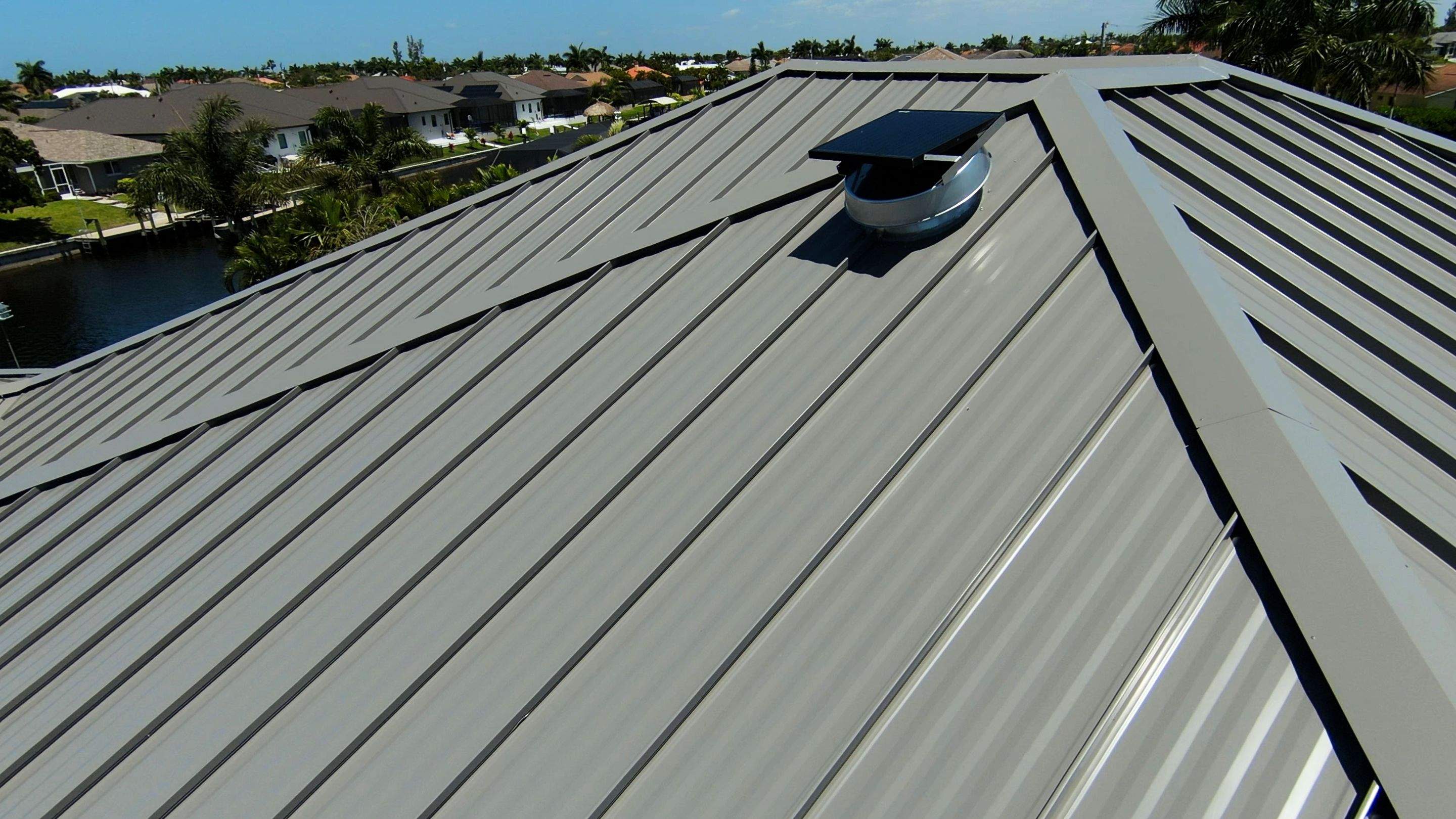 Residential Roofing Installation using Gulf Coast Metals Gulf Seam Panels by Four Peaks Roofing