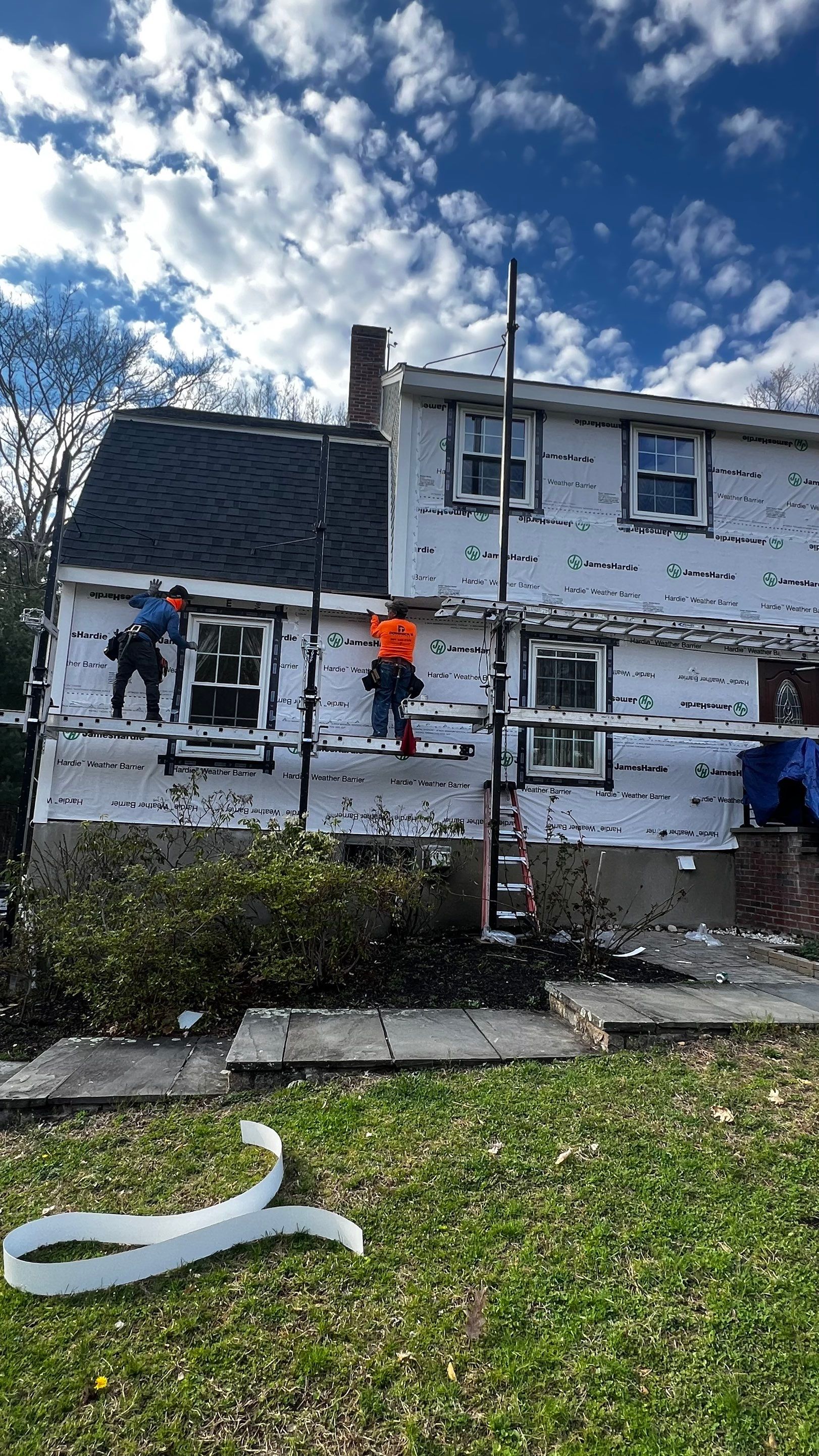 Custom window trim work and siding replacement in Dover, MA by UBrothers Construction