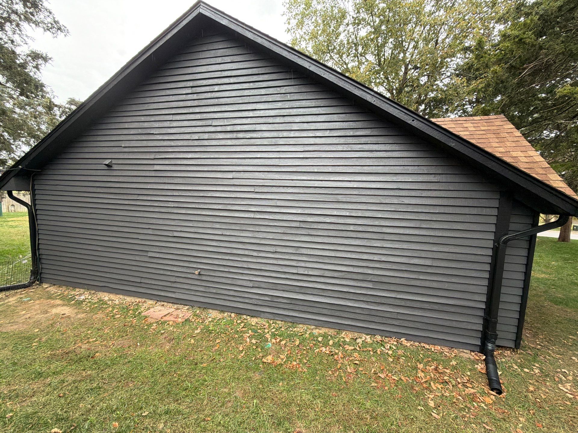Wood siding refresh by Pezley Painting