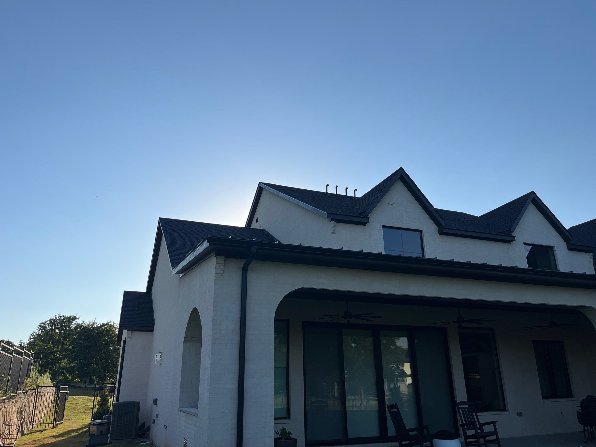 GAF-Charcoal with White Brick  by Tejas Roofworks + Restoration