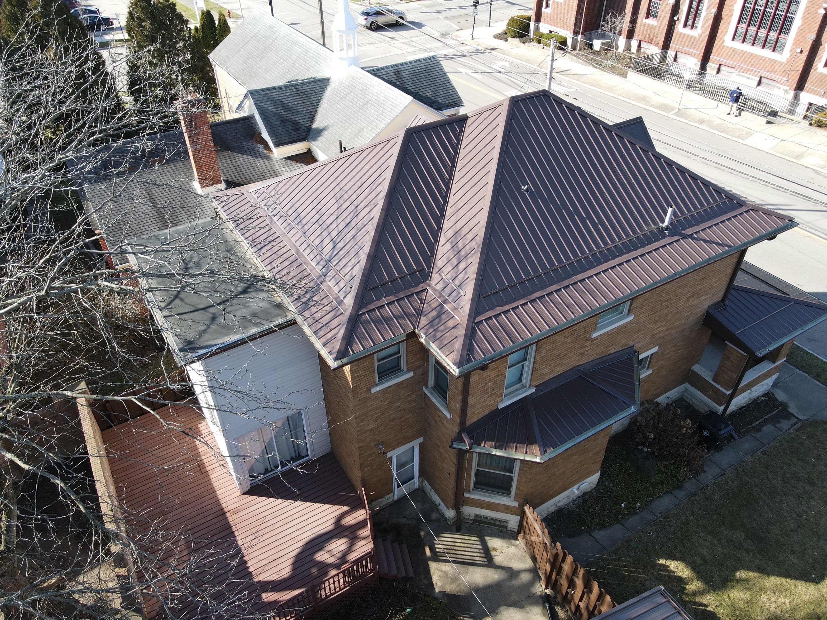 Residential Roofing Installation using Performance Panel Metal - Brown by RoofX