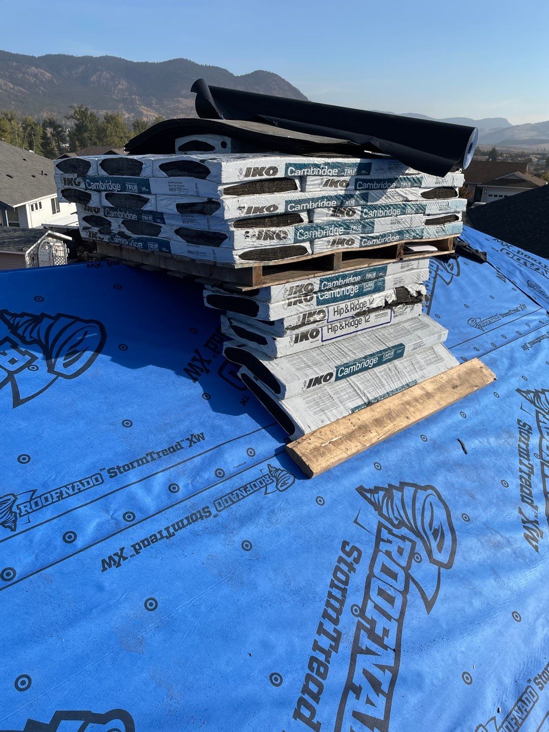 Residential Roofing Installation using IKO Weatherwood shingle by Top Notch Roofing Inc