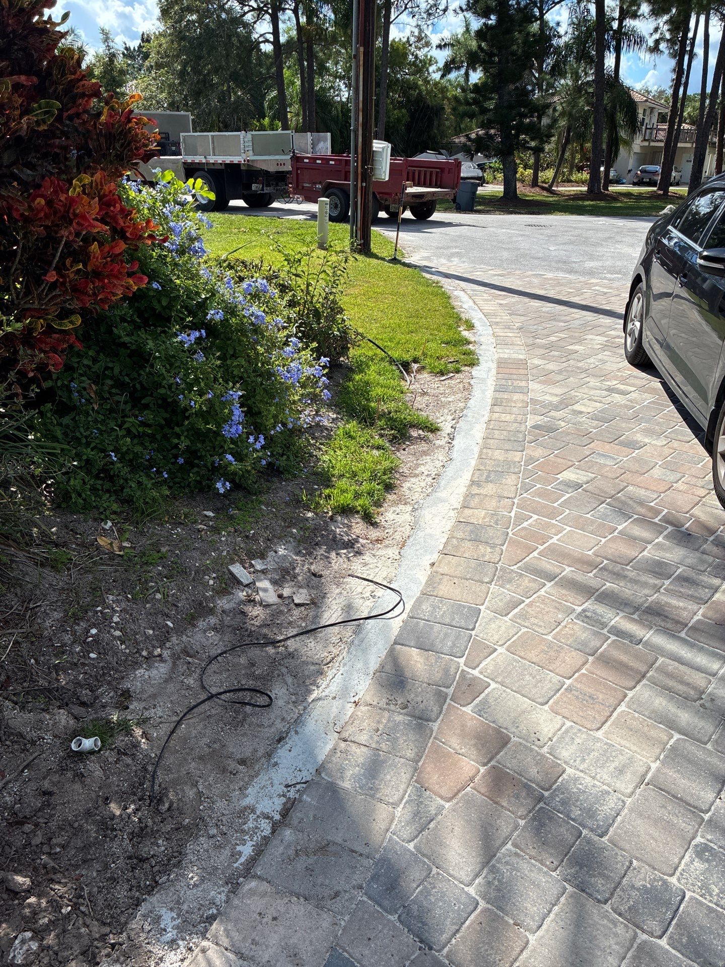 Stuart Showcase: Turning Concrete Chaos into Paver Perfection by Alpha Zeta Enterprises Inc